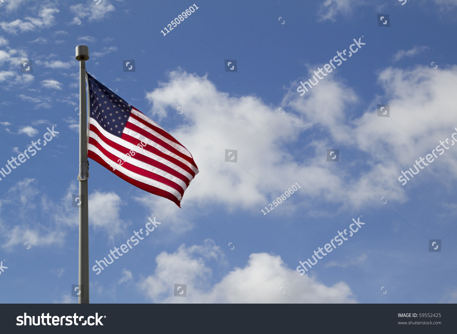 American Flag In Front Of Blue Sky Stock Photo 59552425 : Shutterstock