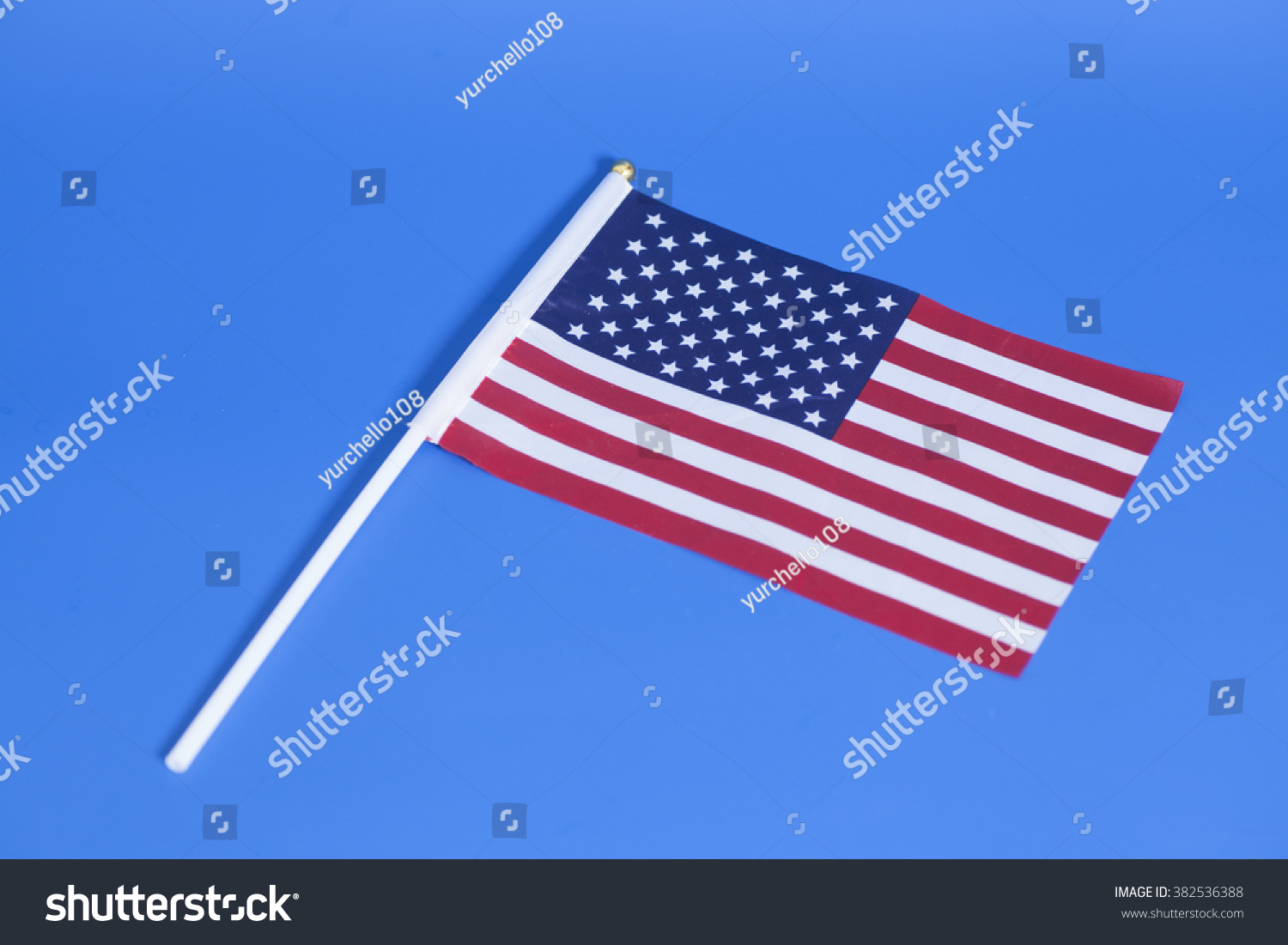 American Flag On Blue Background Stock Photo 382536388 : Shutterstock
