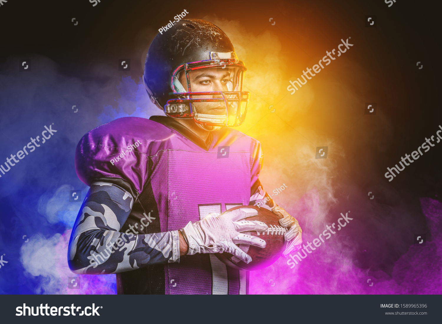 american-football-player-smoke-on-dark-stock-photo-1589965396