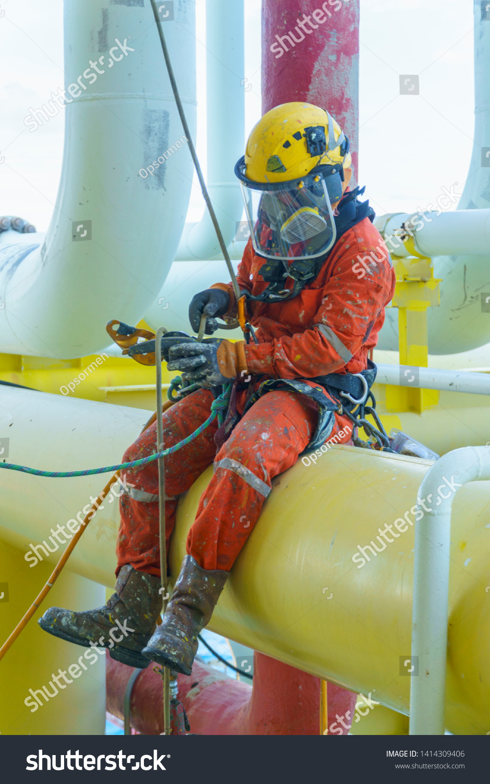 abseiler-wearing-personal-protective-equipment-ppe-stock-photo-edit