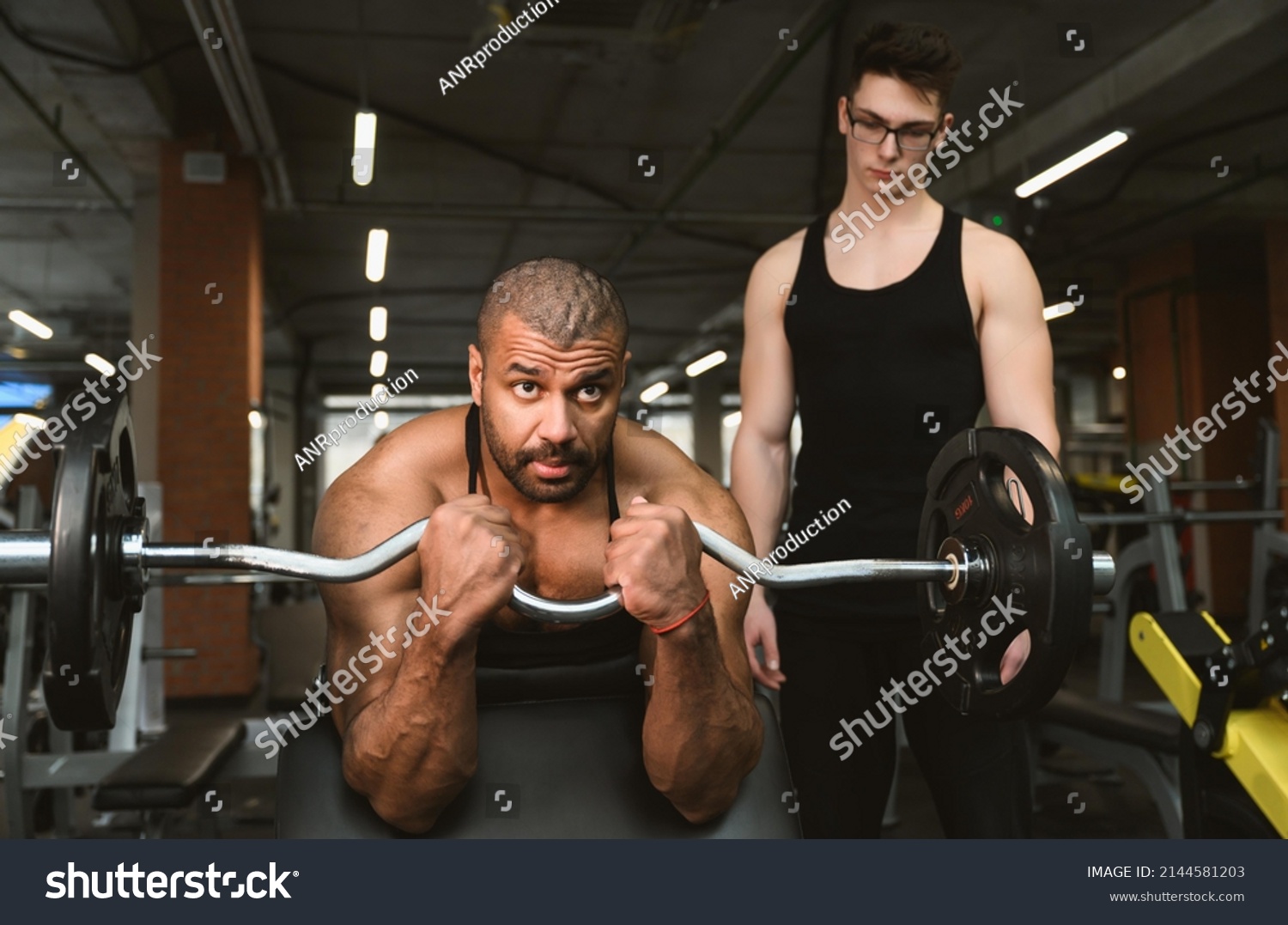 African American Male Bodybuilder Performs Biceps Stock Photo ...