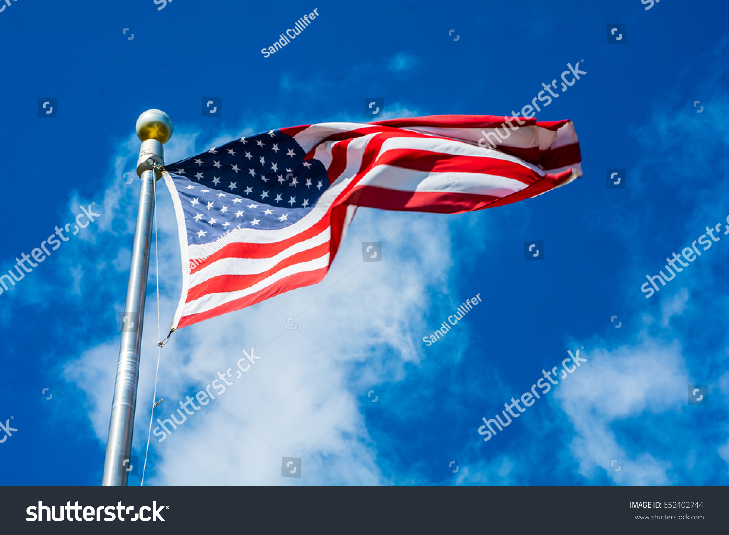 American Flag Blowing Wind Clouds Blue Stock Photo (Edit Now) 652402744