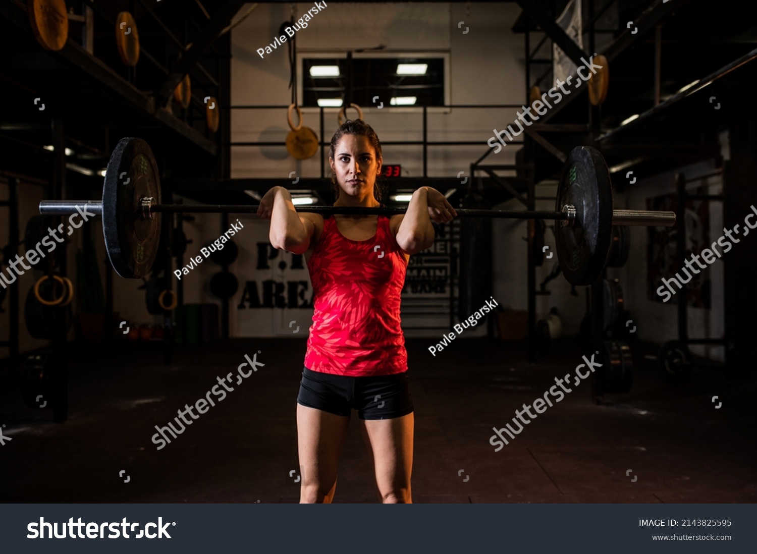 Attractive Muscular Woman Lifts Rubber Weight Stock Photo 2143825595 ...