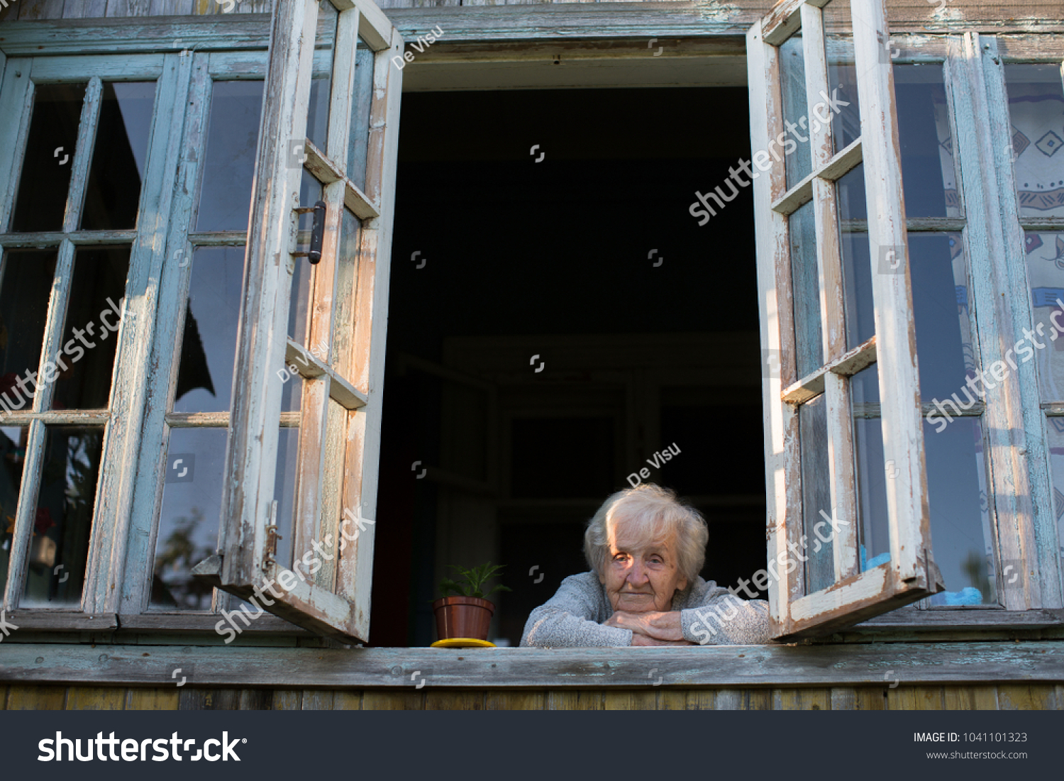  Tawny Brown Classic  Template Design Featuring an Elderly Woman Looks Out of the Window
