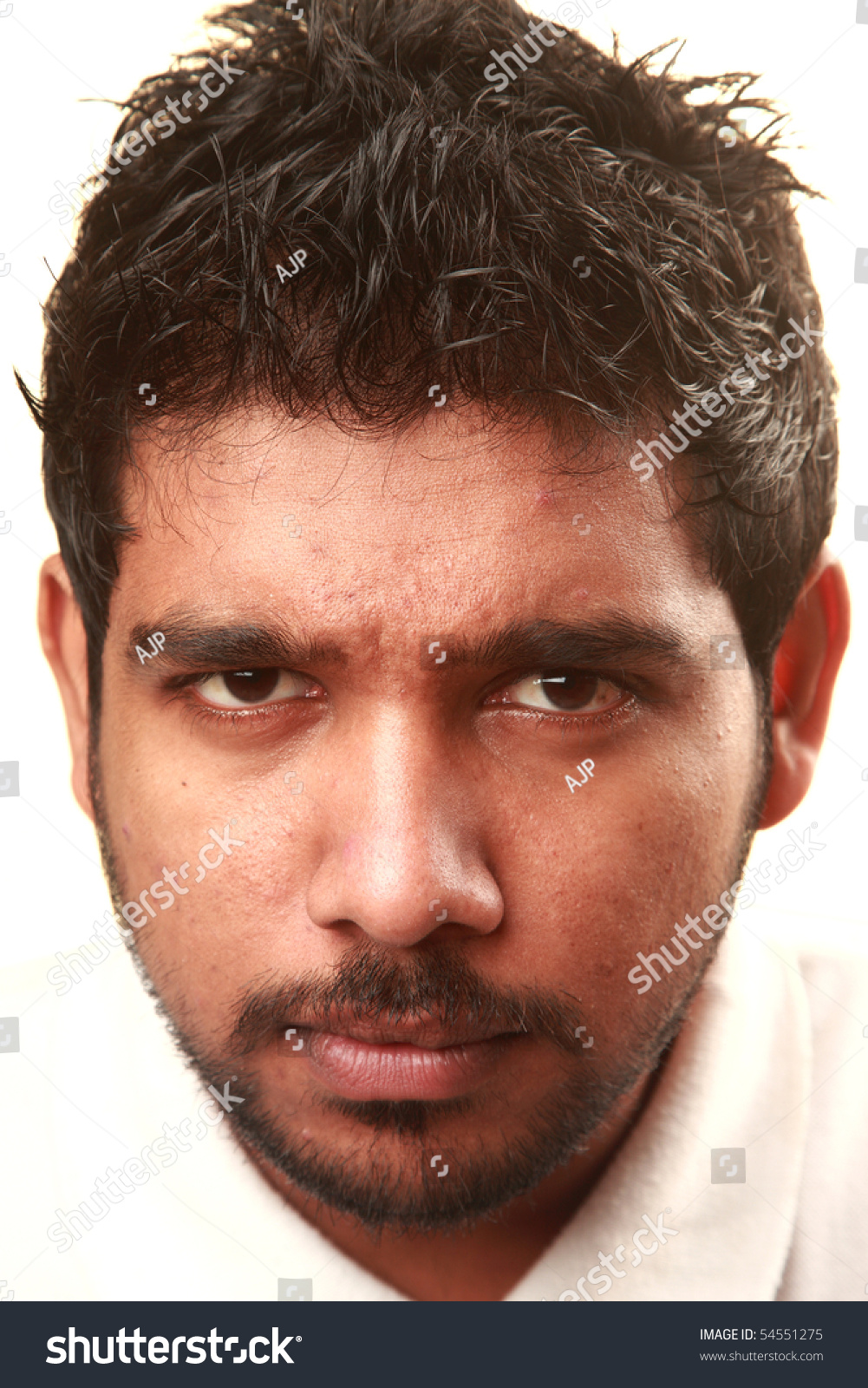 An Indian Young Man Giving A Sharp Look Stock Photo 54551275 : Shutterstock