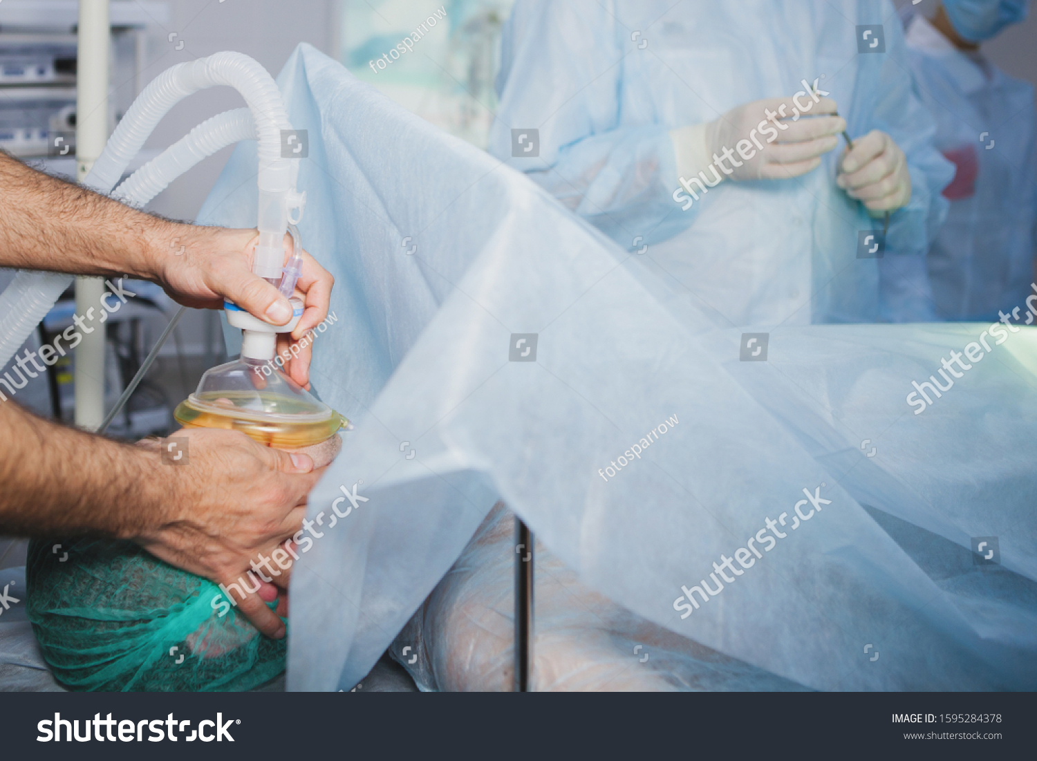 Anesthesiologist Puts On Mask Inhalation Anesthesia Stock Photo (Edit ...