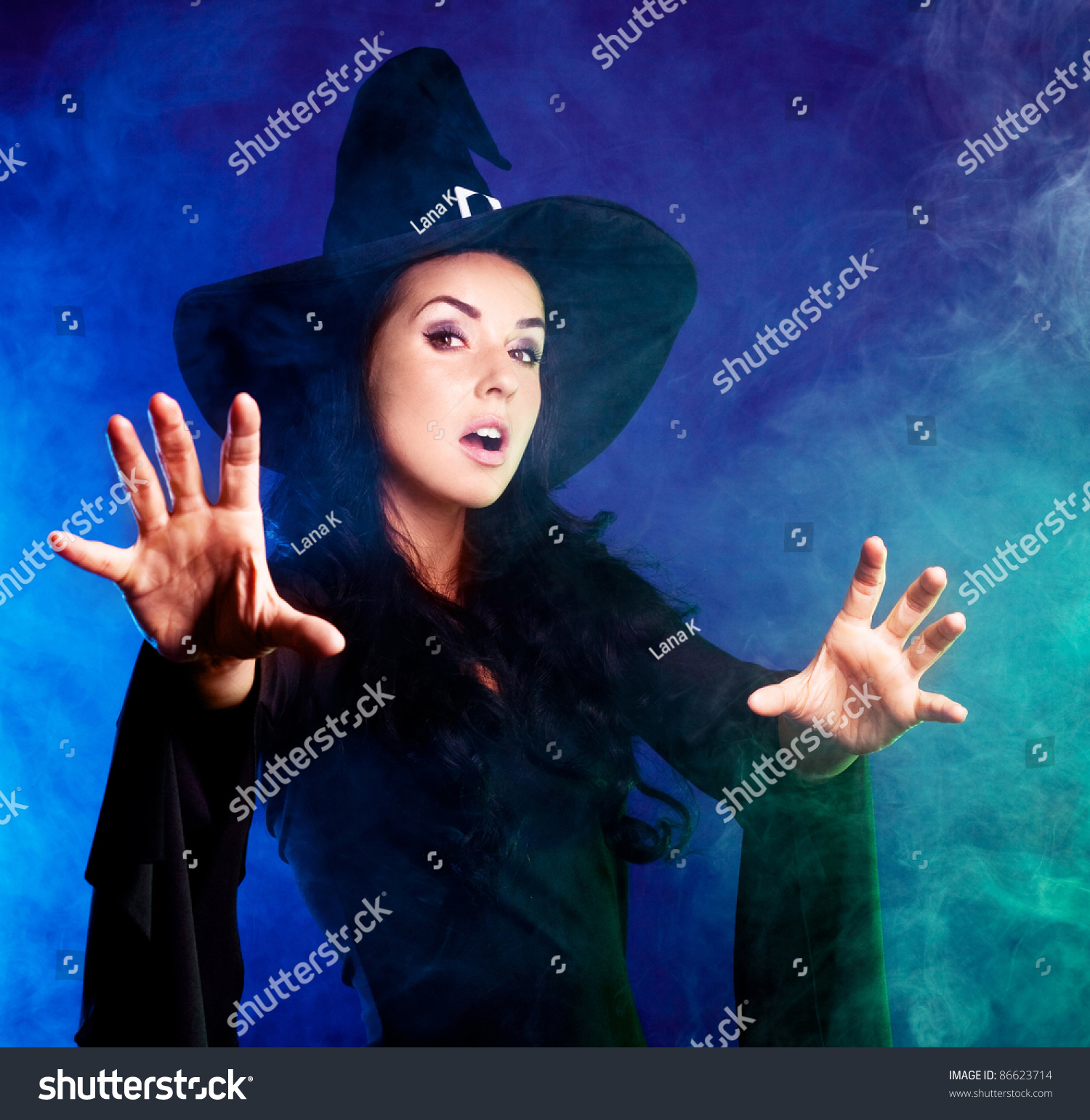 Angry Brunette Witch Saying The Spell And Stretchign Her Hands To Us ...