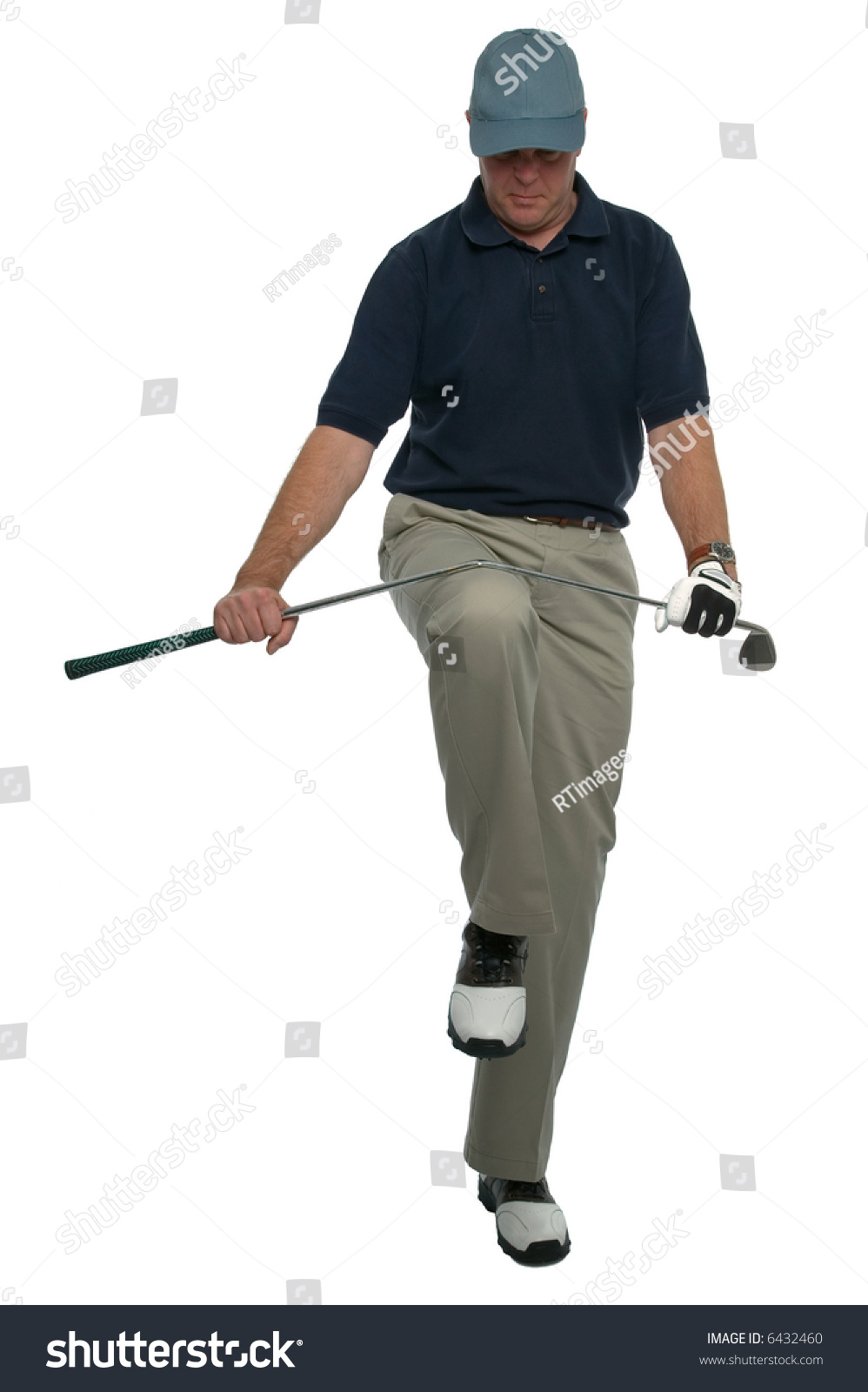 Angry Golfer Breaking A Club Over His Knee. Stock Photo 6432460 ...