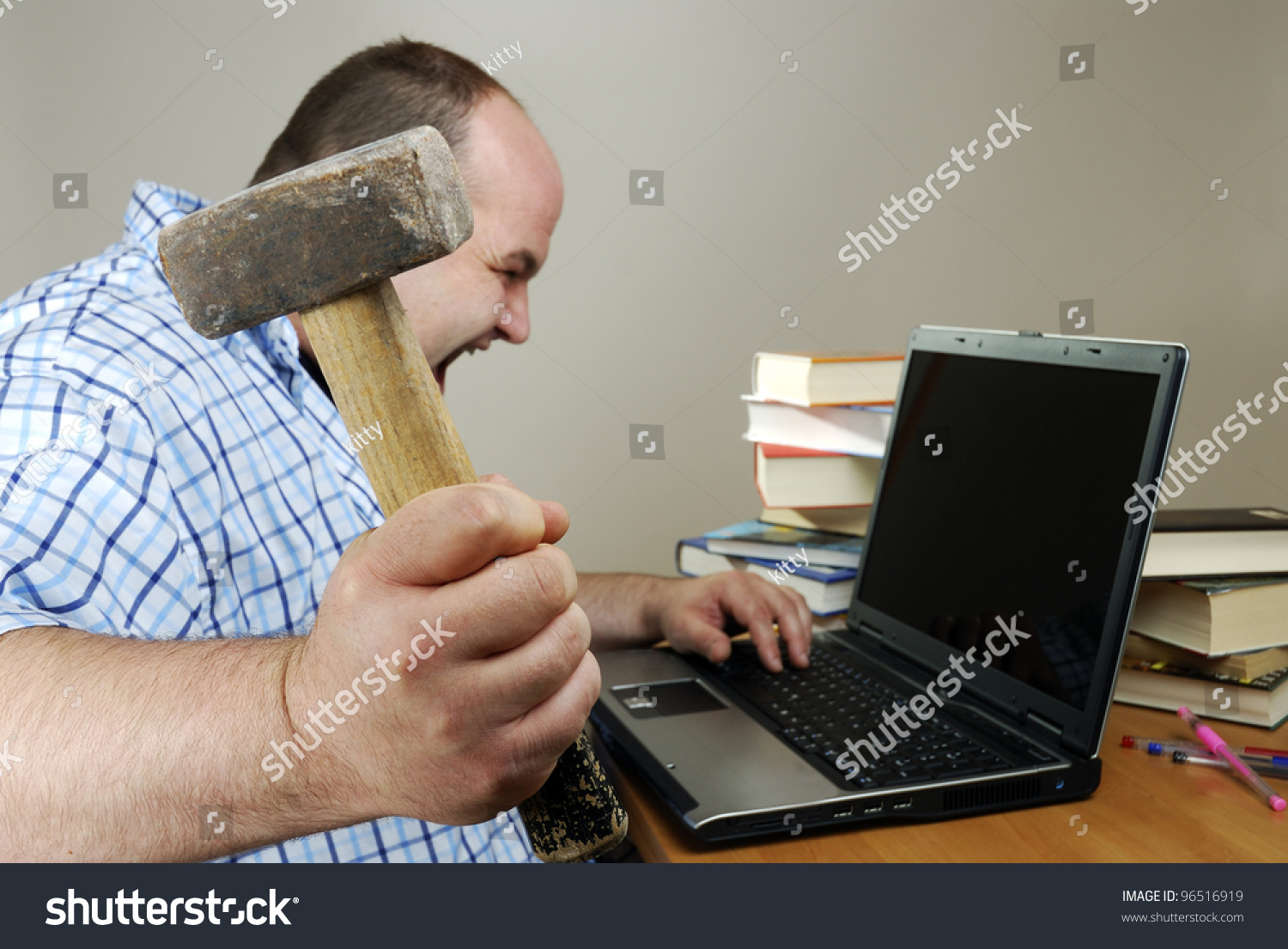 stock-photo-angry-man-is-about-to-smash-his-computer-96516919.jpg