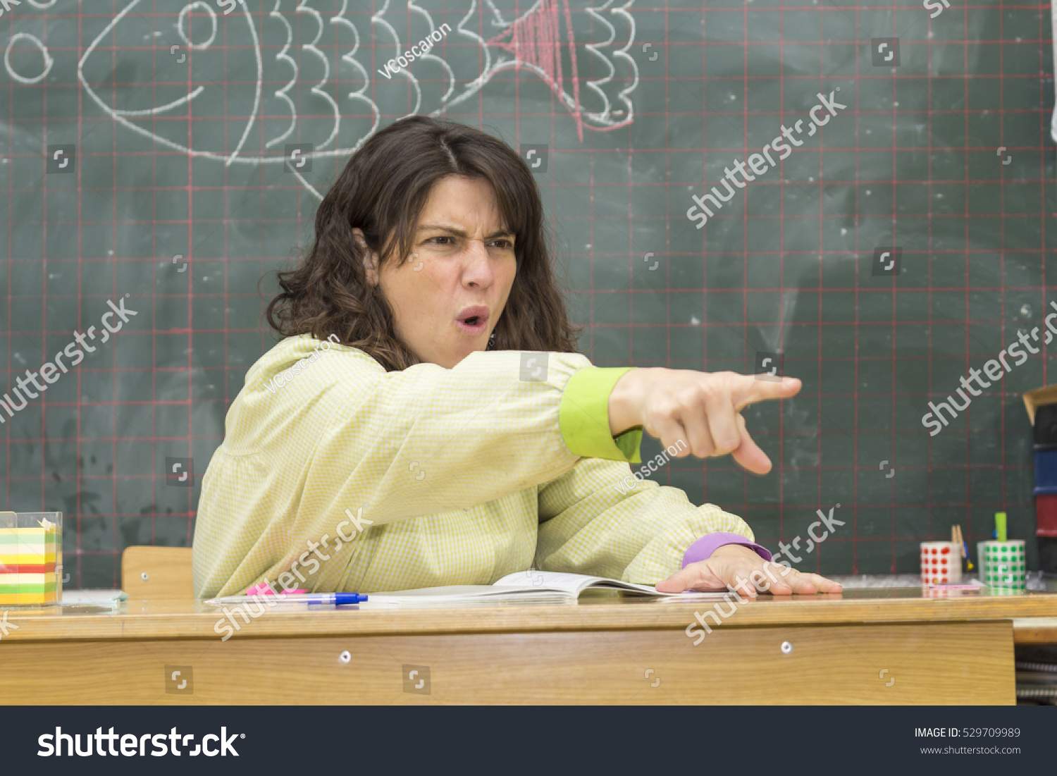 Angry Teacher Pointing Out On Backboard Stock Photo Edit Now 529709989