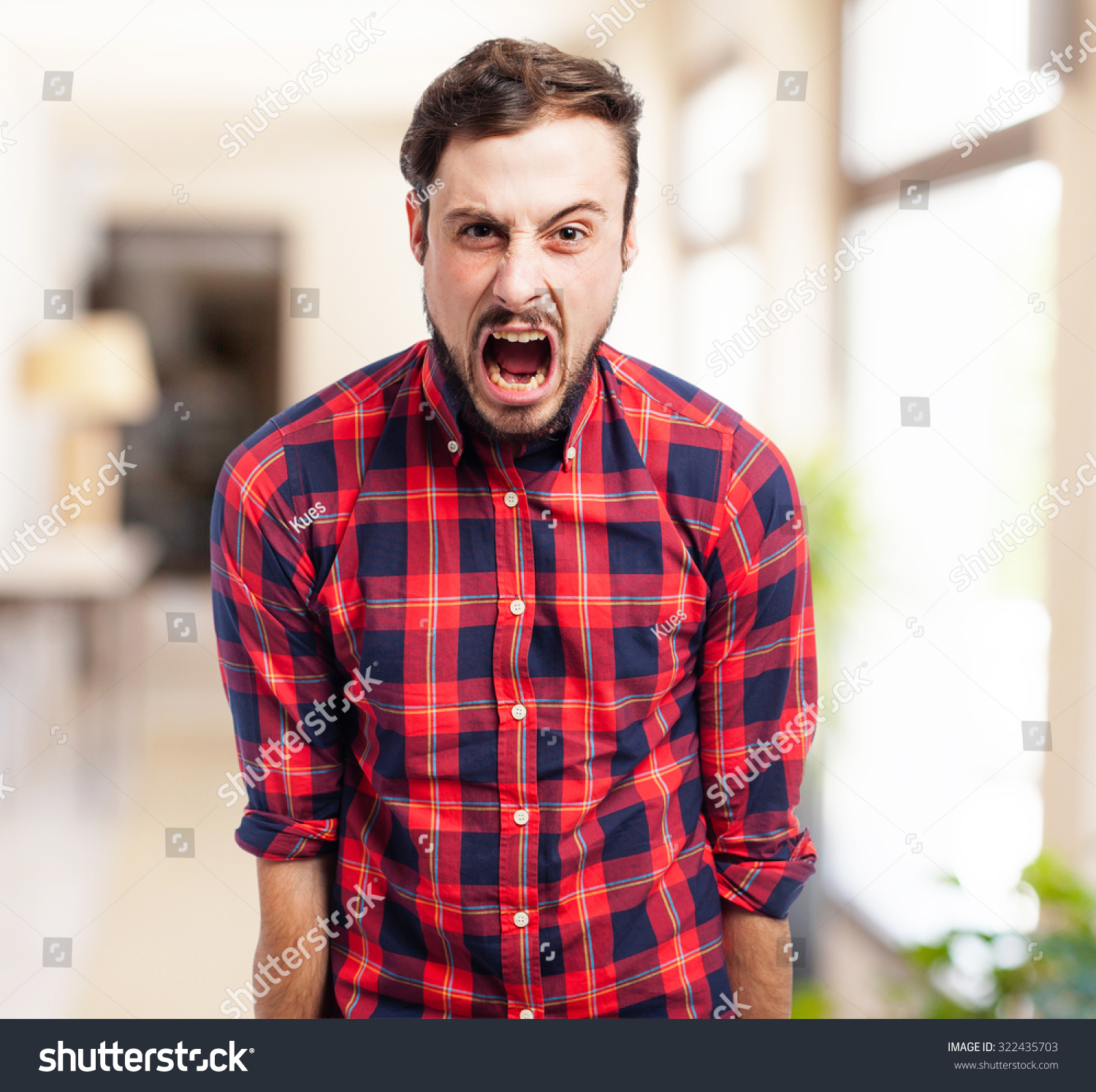 angry-young-man-shouting-stock-photo-322435703-shutterstock