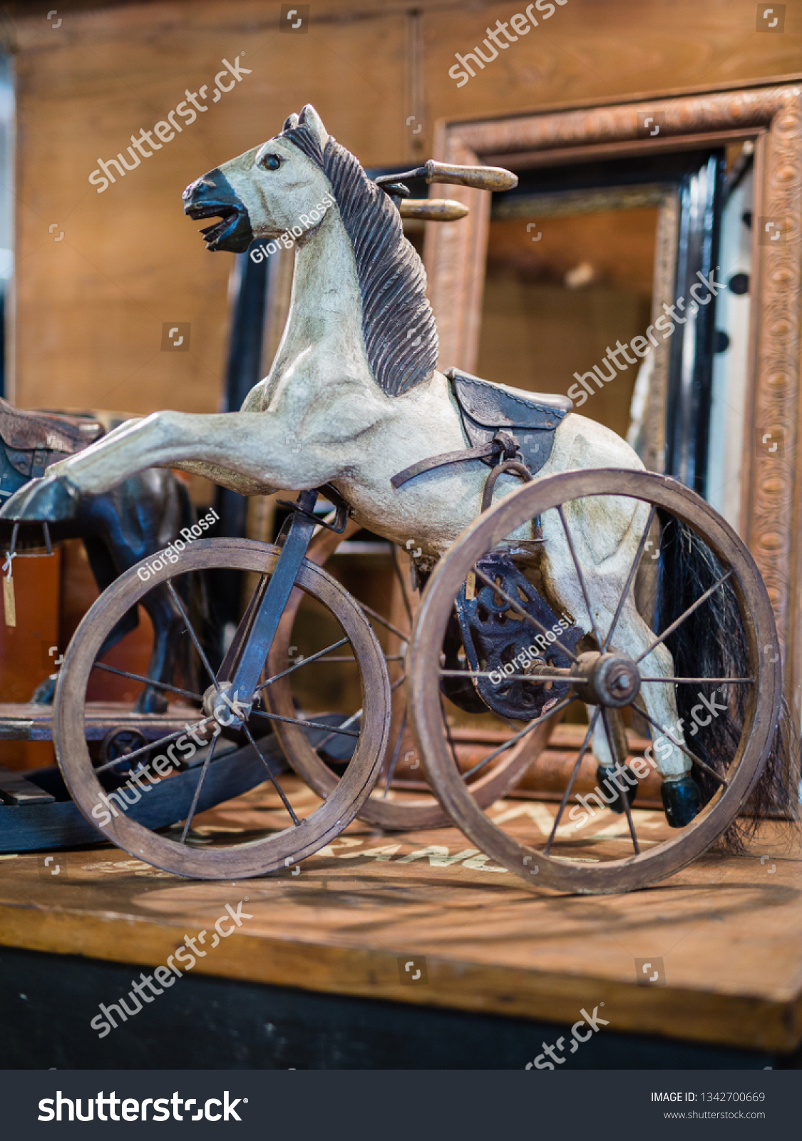 vintage wooden horse on wheels