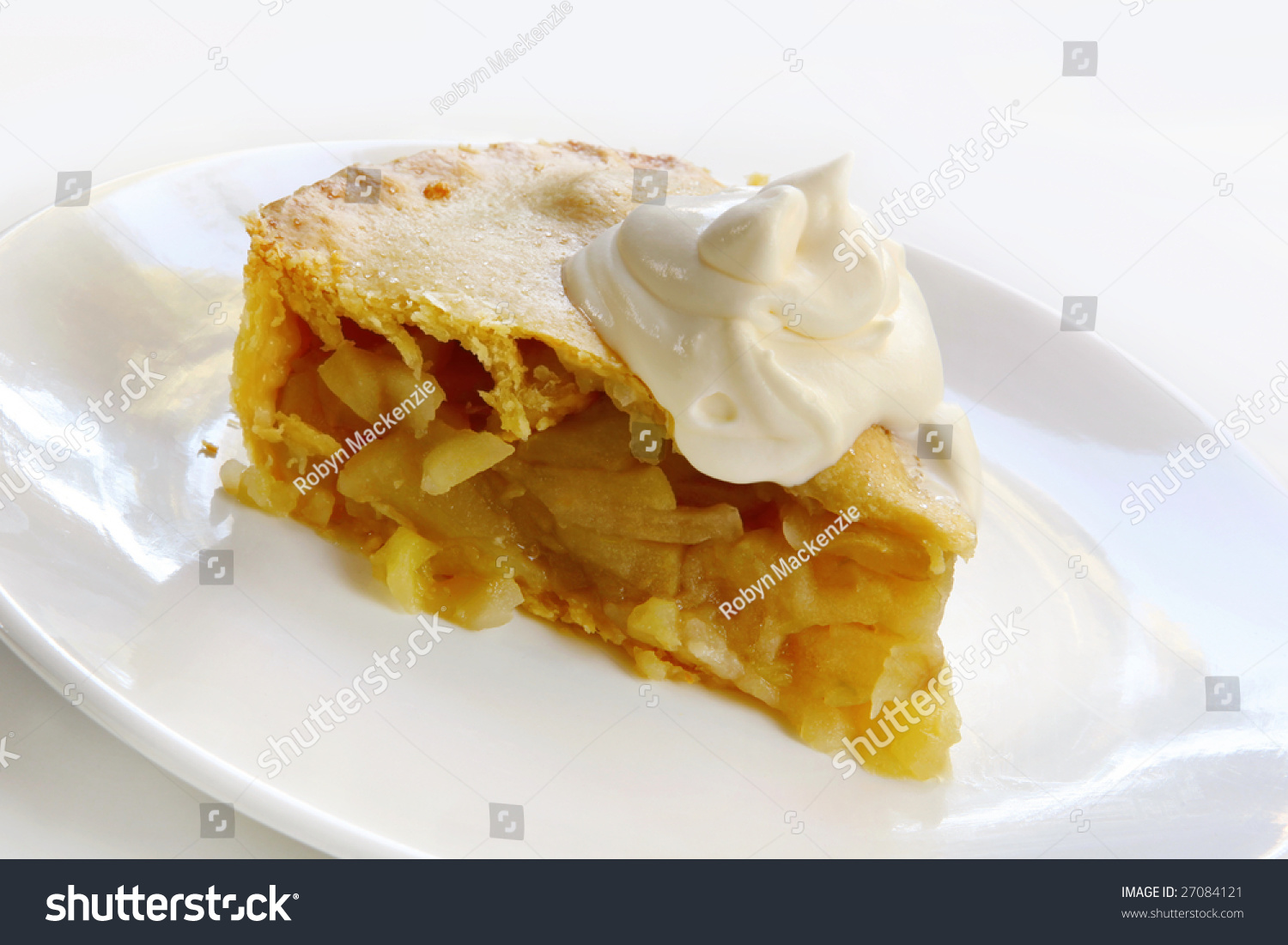 Apple Pie With Fresh Whipped Cream. A Home-Baked Treat. Stock Photo ...