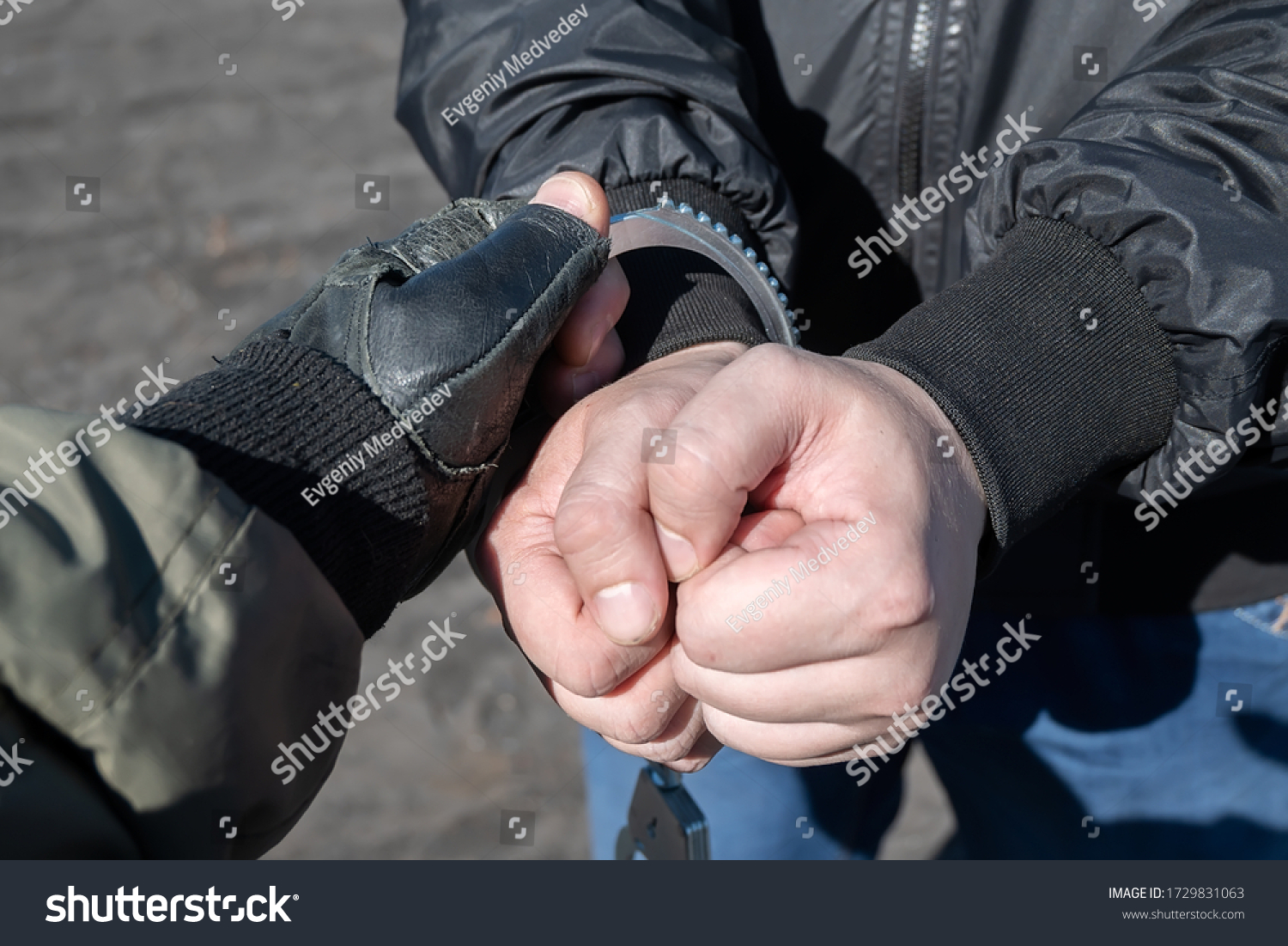 Arrest Criminal Police Officer Puts Handcuffs Stock Photo 1729831063 ...