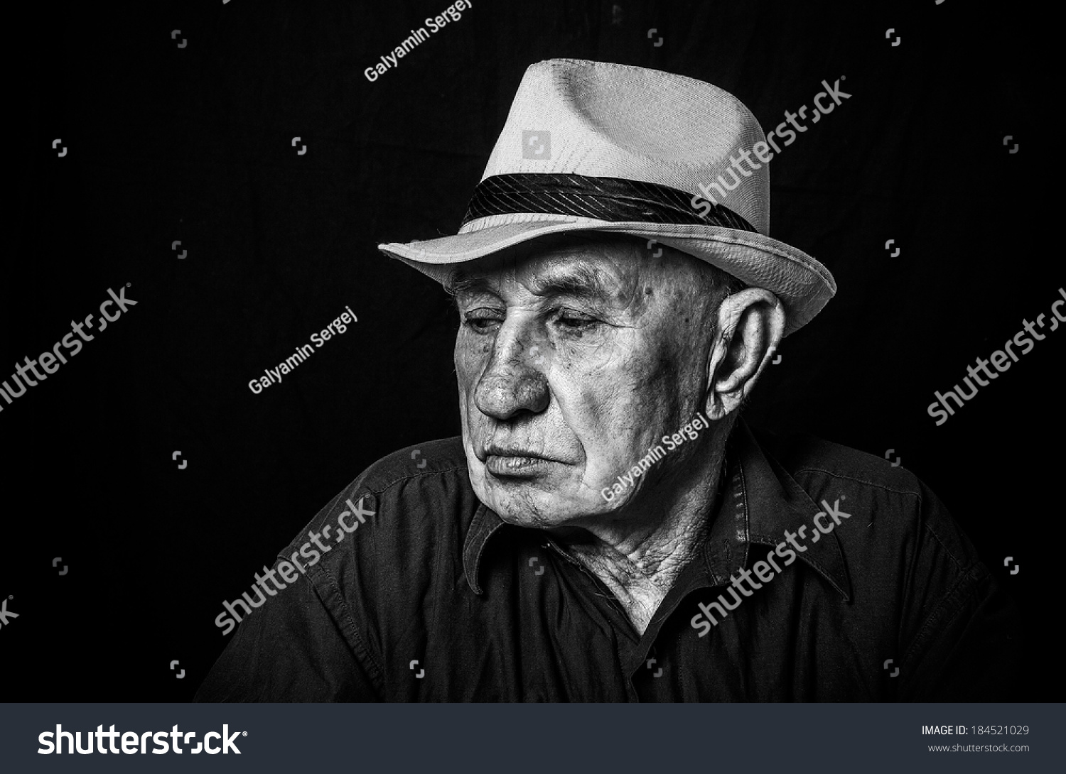 old man in a hat