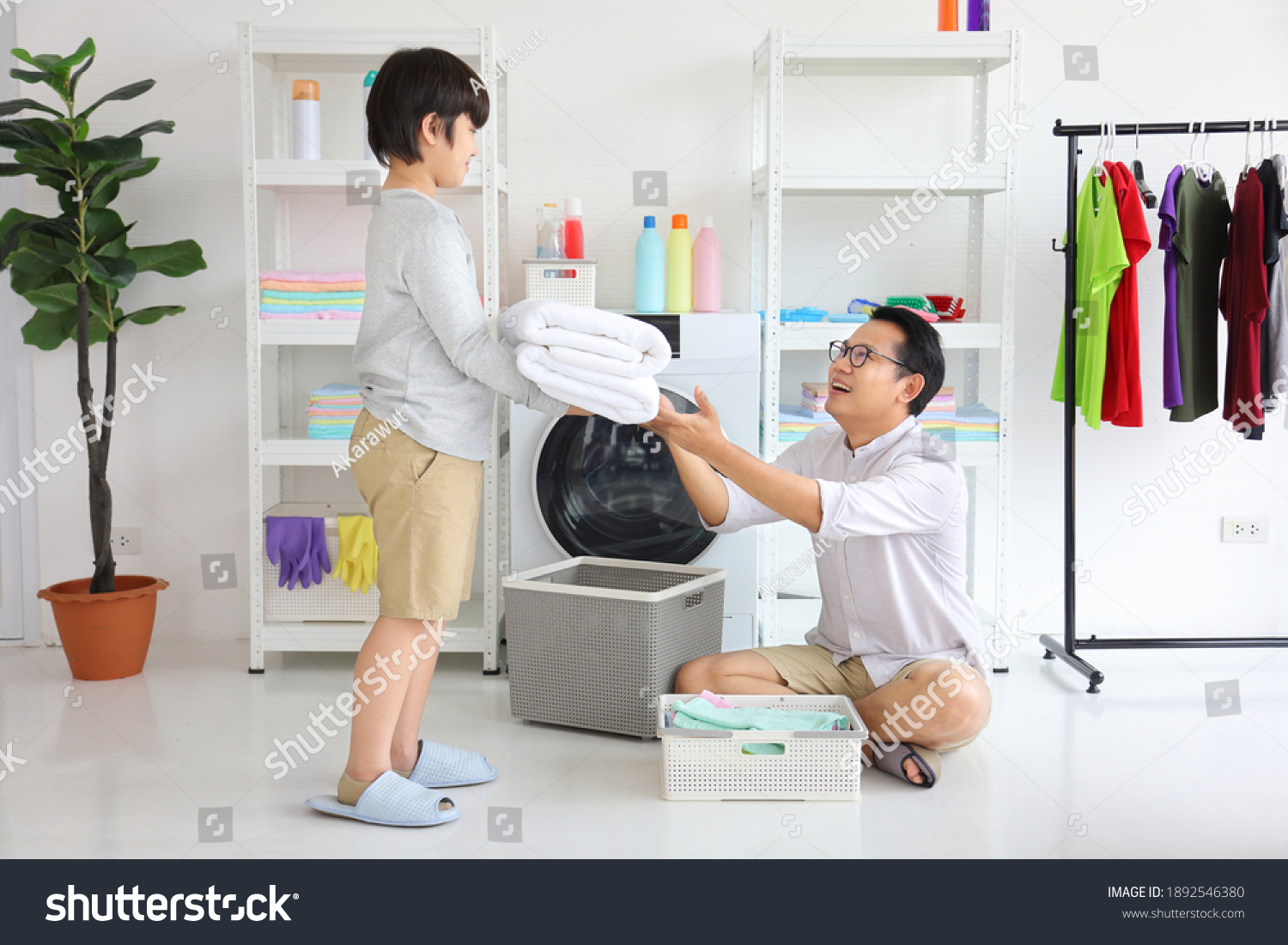 1,540 Asian doing laundry Stock Photos, Images & Photography | Shutterstock