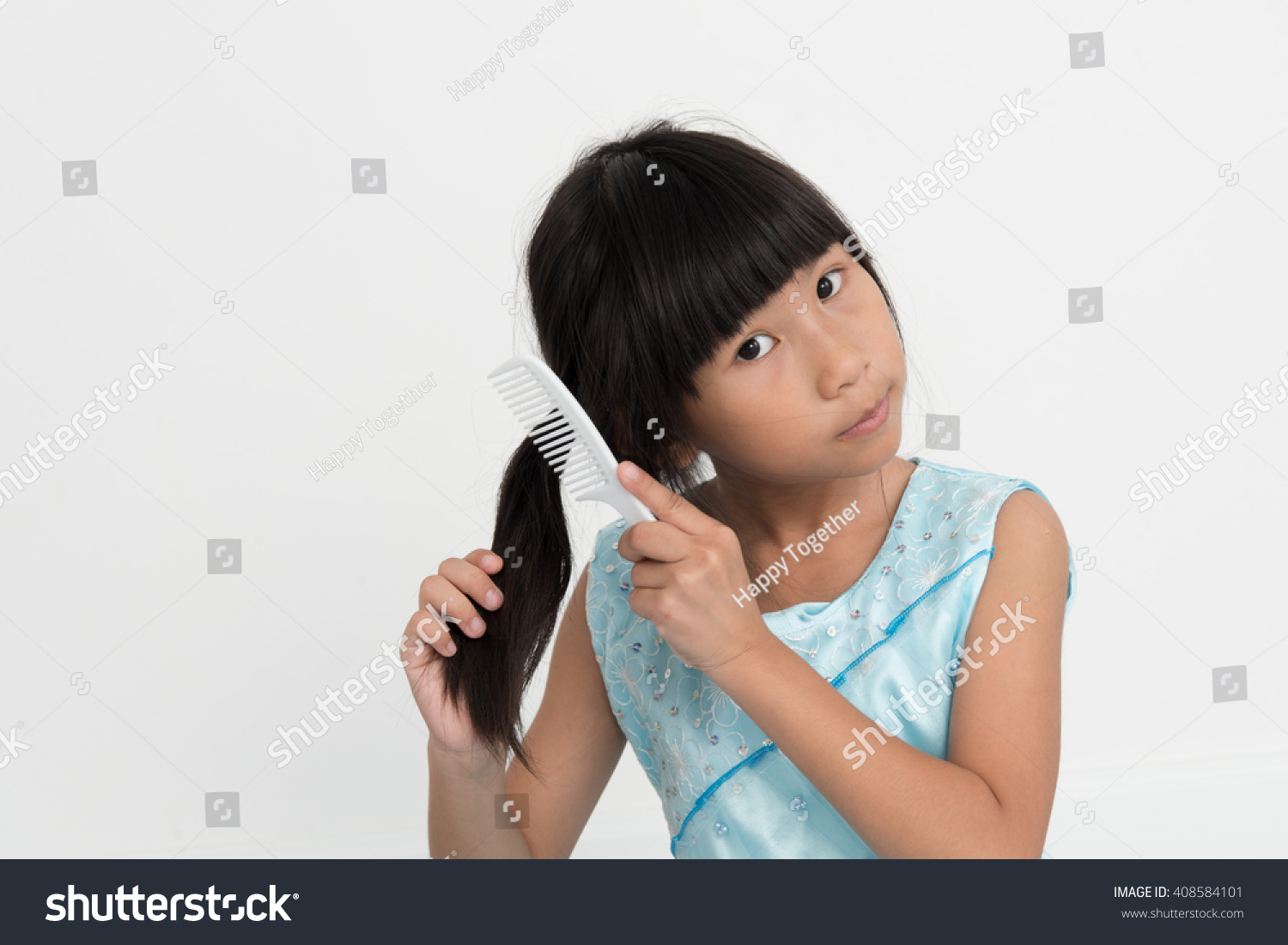 Asian Girl Brushing Her Hair On Stock Photo (Edit Now) 408584101