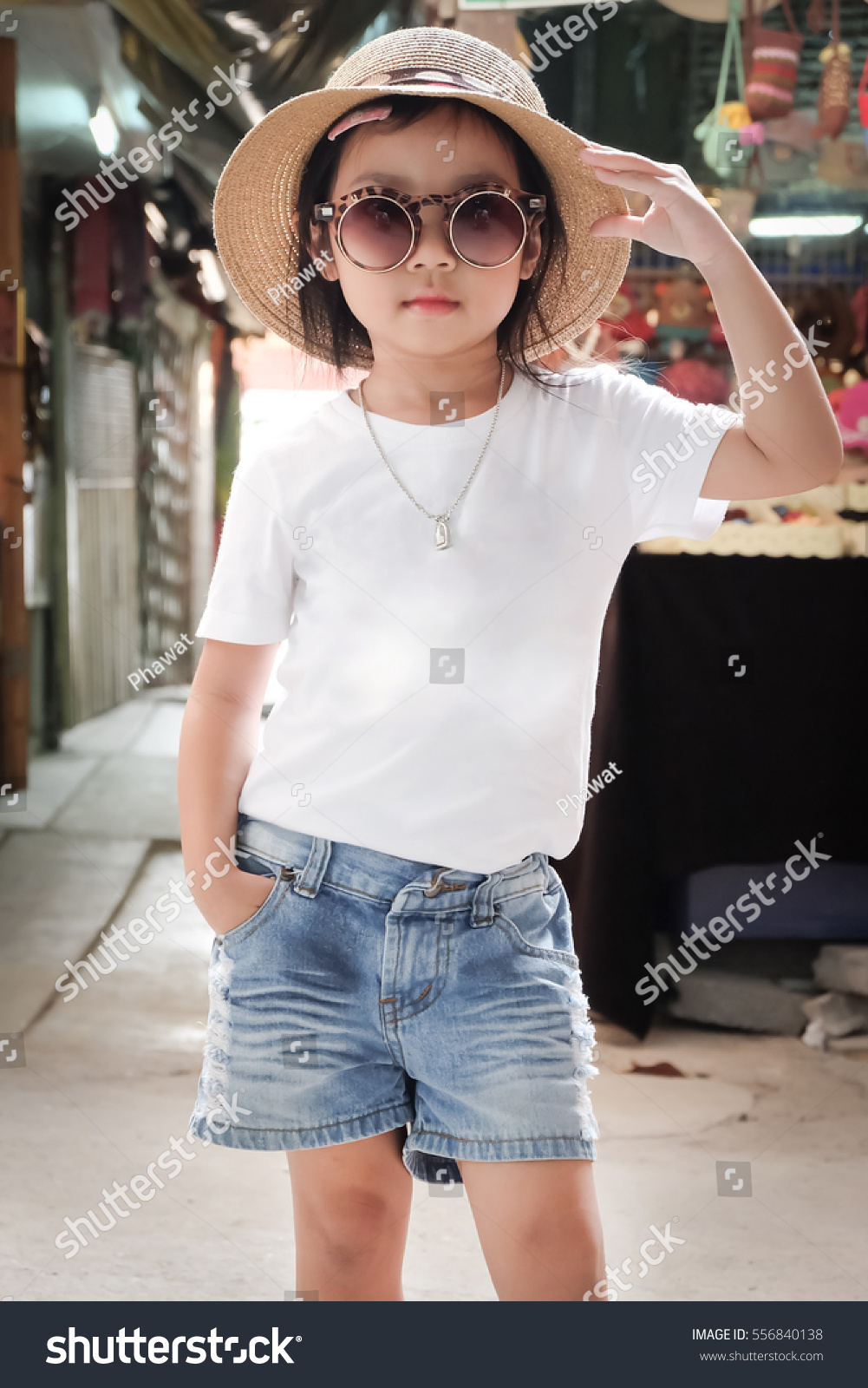 white shirt and jean shorts