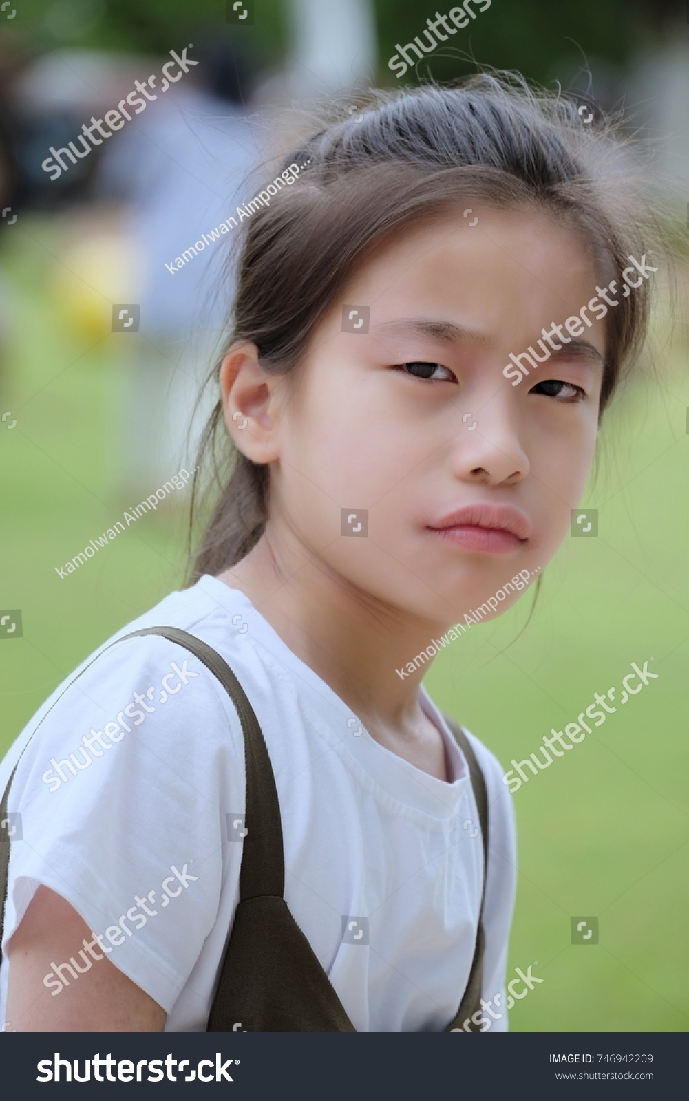 asian girl making faces
