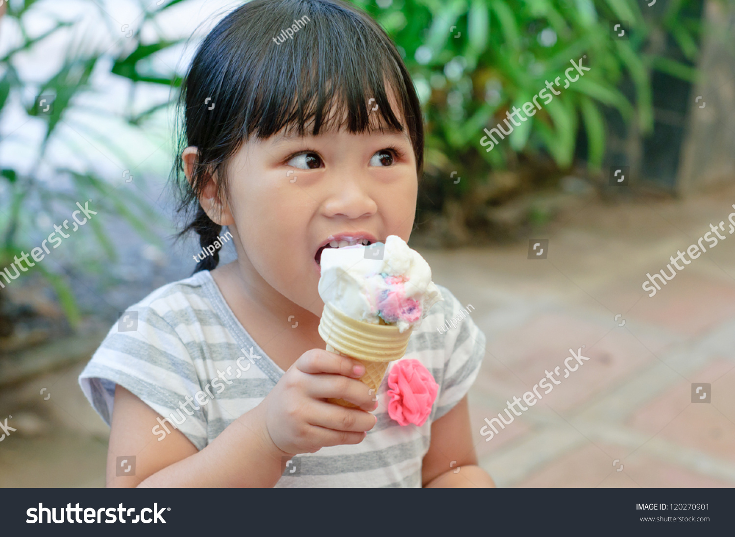 Asian Little Girl Eating Ice Cream Stock Photo 120270901 - Shutterstock