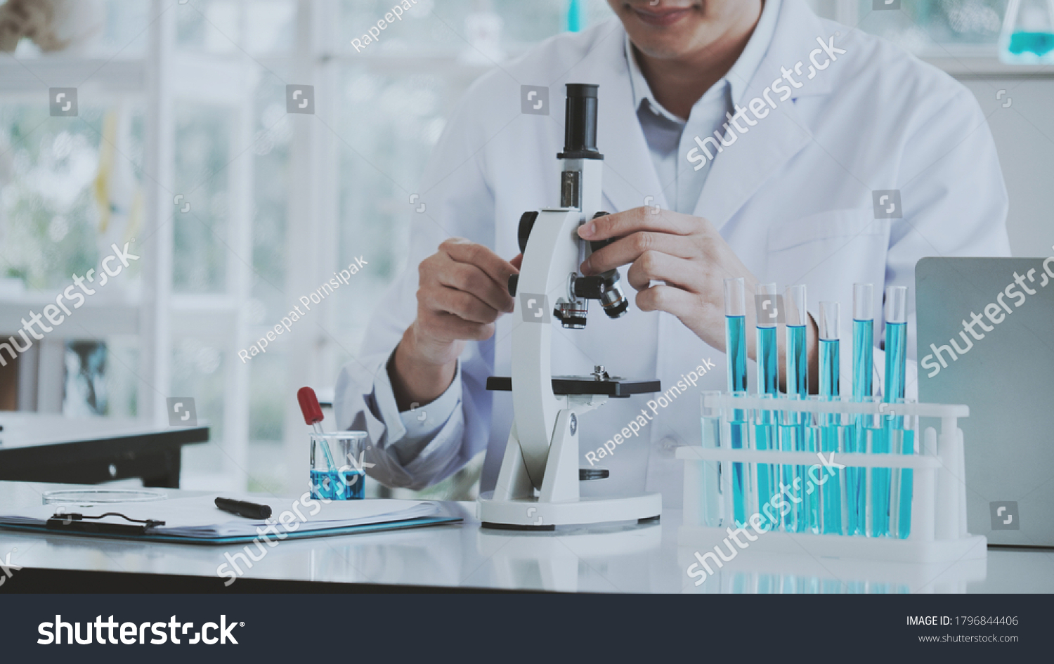Asian Scientist Doctor Use Microscope Test Stock Photo 1796844406