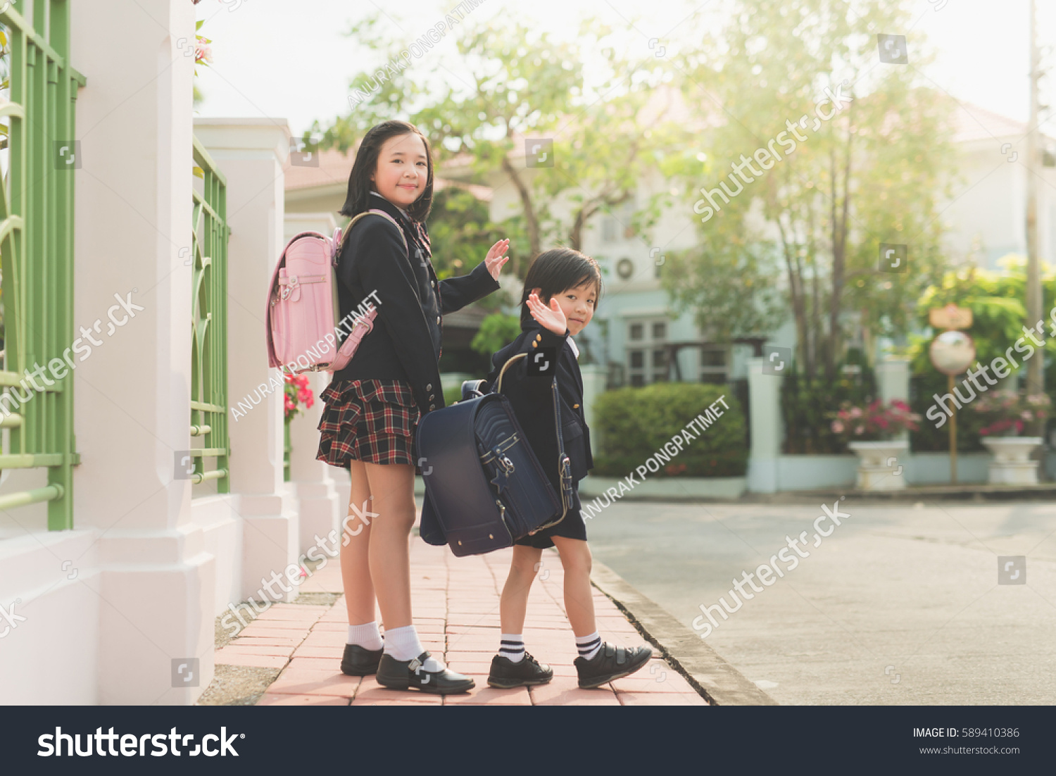 Asian Students Going School Waving Goodbye Stock Photo 589410386 ...