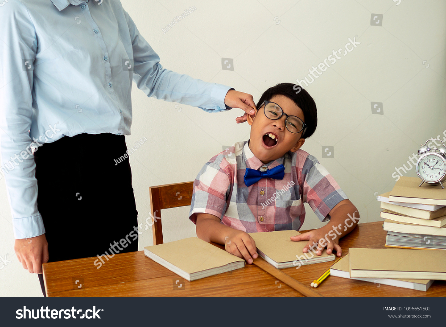 student punished by teacher