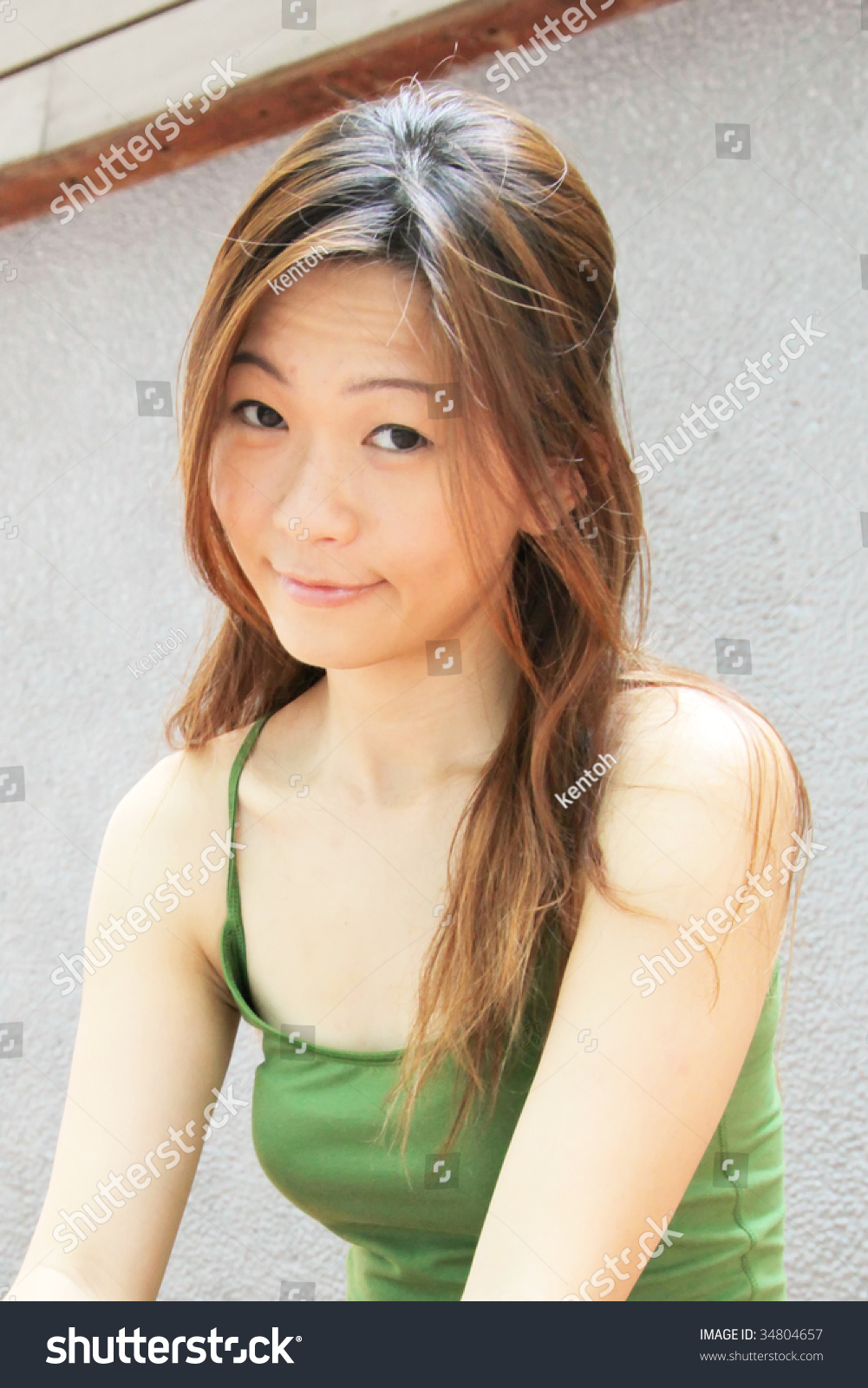 Asian Teen Yeah Right Sarcastic Expression Stock Photo -3436