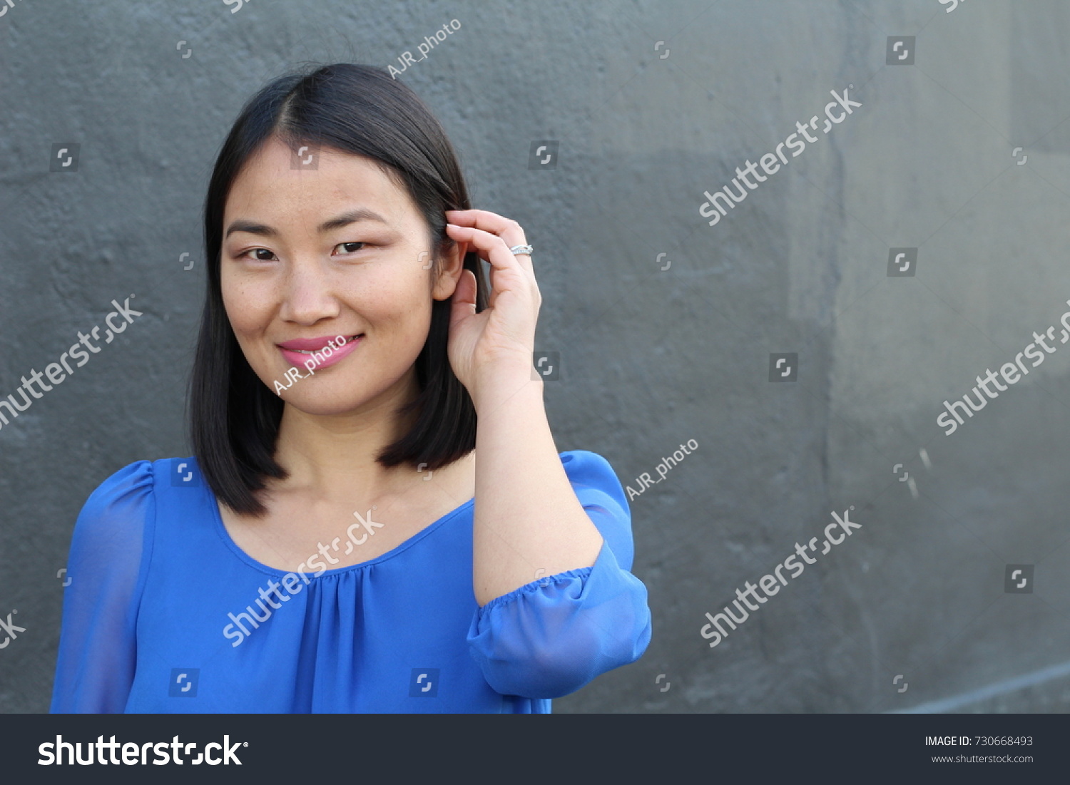Asian Woman Touching Her Hair Copy Stock Photo 730668493 | Shutterstock
