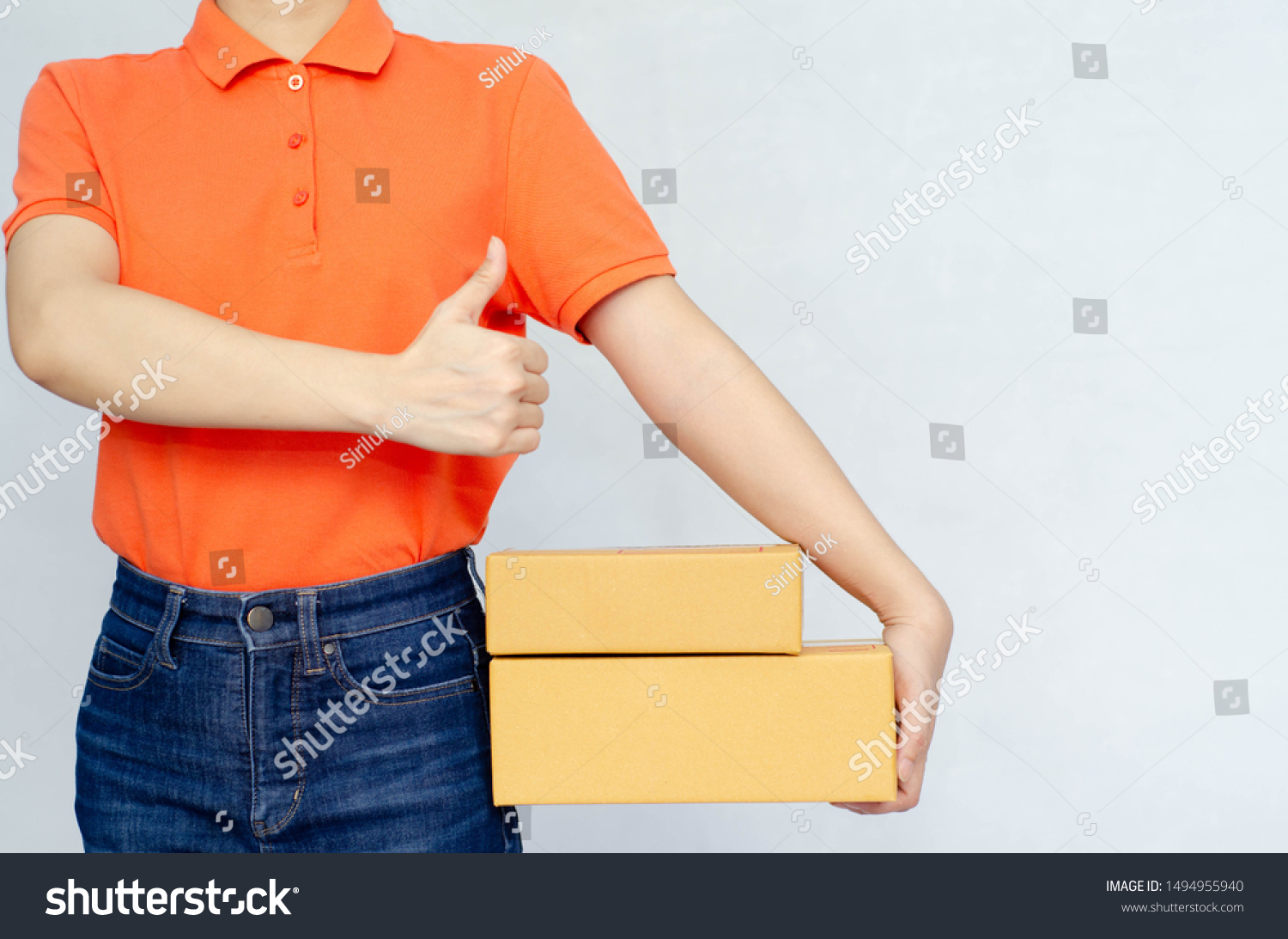 brown pants orange shirt