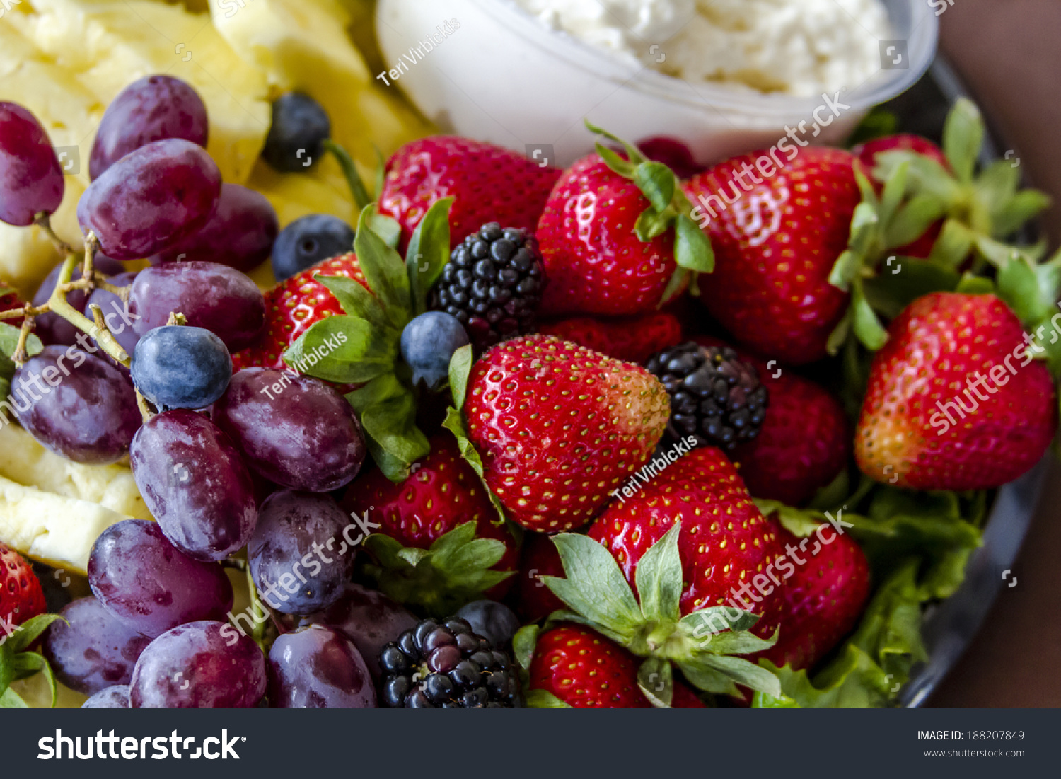 Assorted Fruit Tray Strawberries Blueberries Grapes Stock Photo