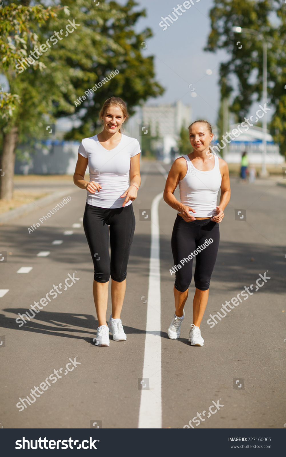 Attractive Smiling Girls Runners On 