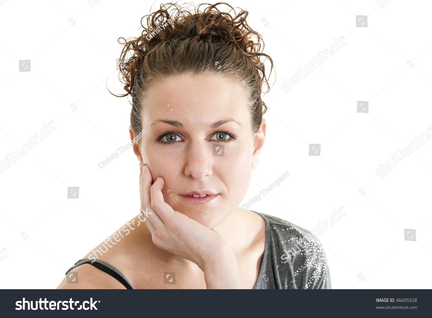 Attractive Caucasian Woman With Her Hand On Her Face Smiling. Stock ...