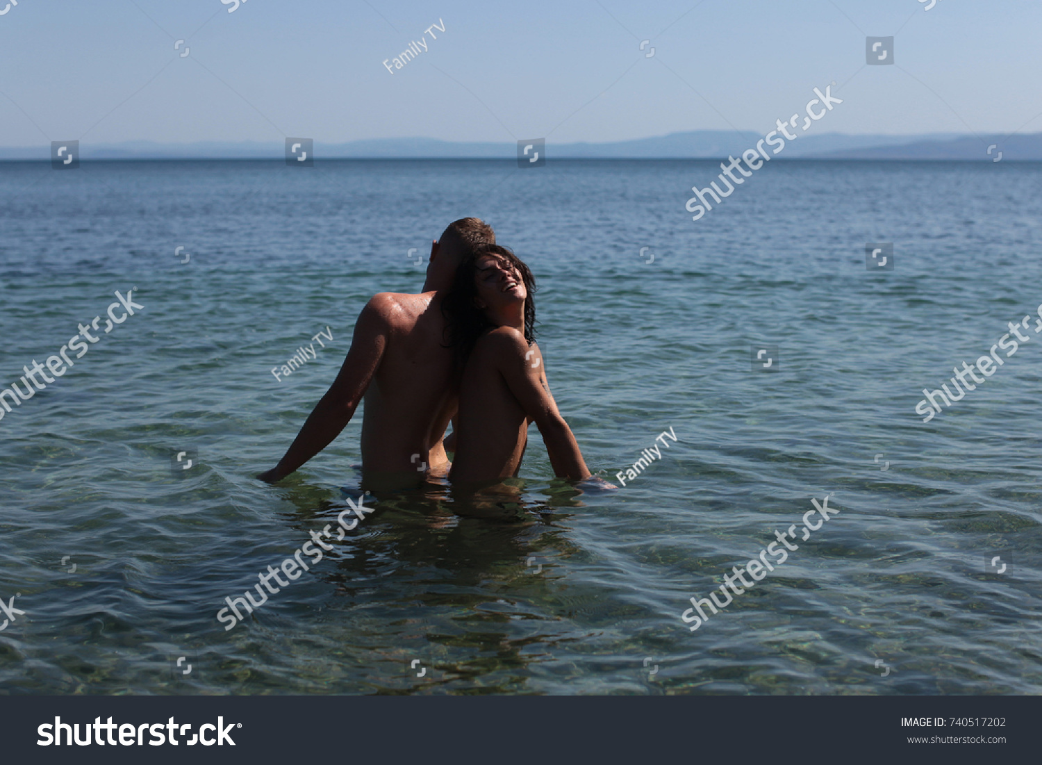 Nude beach couple