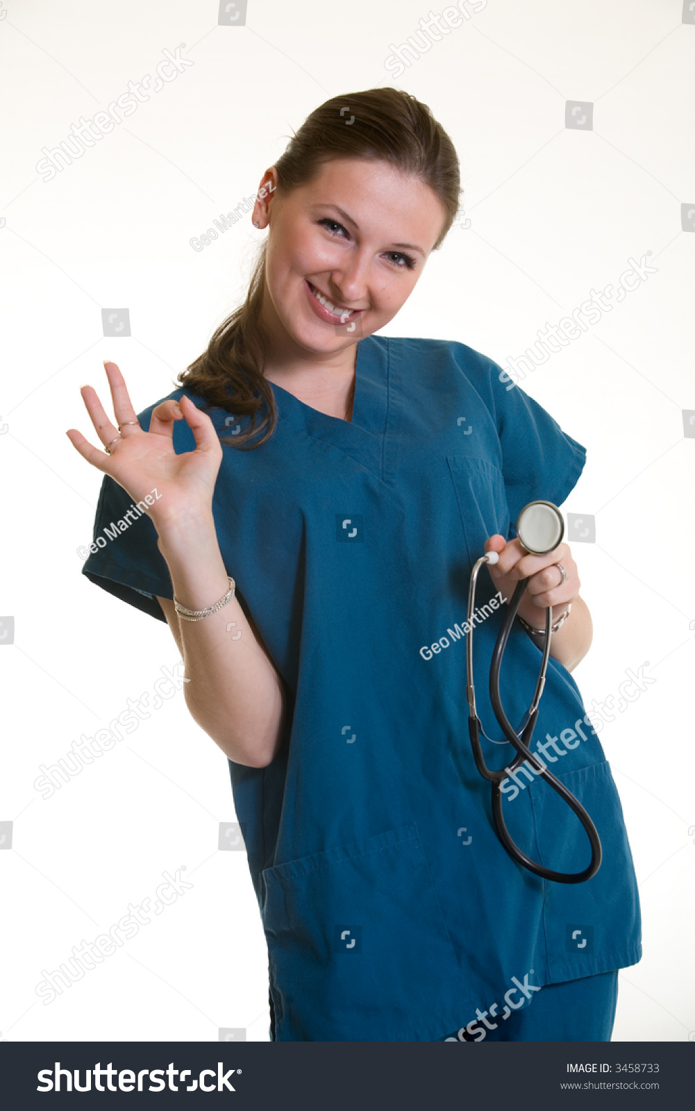 Attractive Friendly Smiling Young Woman Nurse Stock Photo Edit Now 3458733