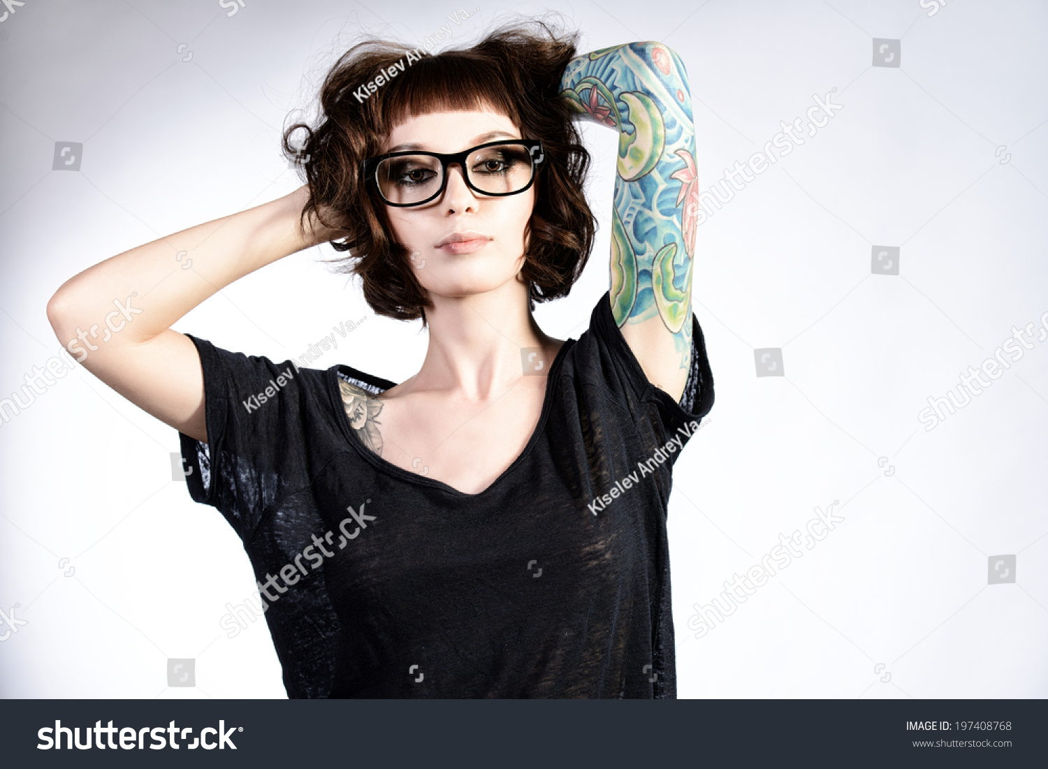 Attractive Girl In Spectacles Alluring In Sexual Clothes. Beauty ...