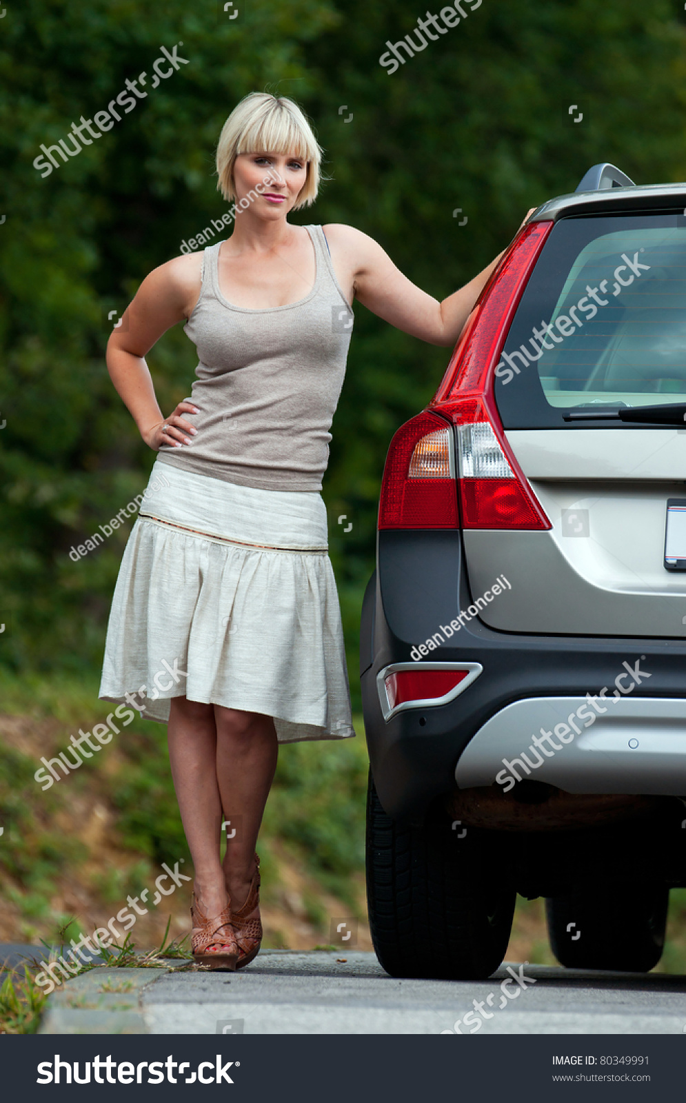 Attractive Woman Standing Next To Her Car Stock Photo 80349991 ...