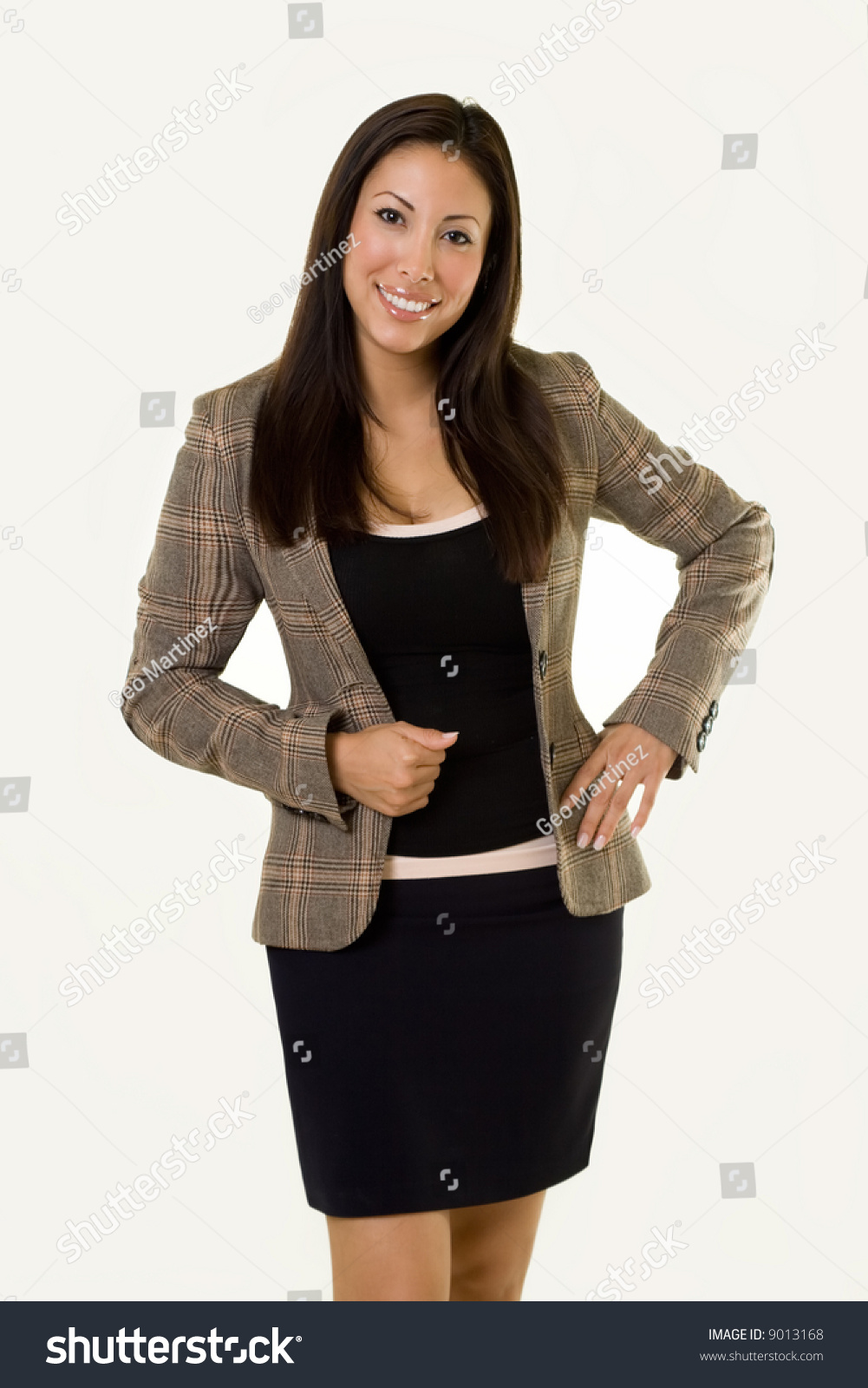 Attractive Young Hispanic Woman Wearing A Business Suit Jacket And ...