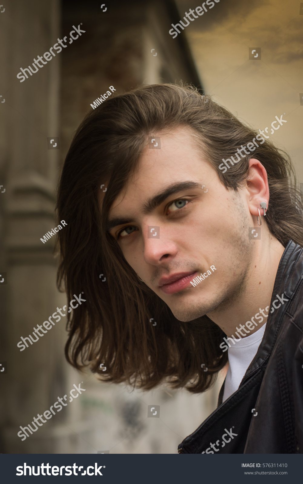 Attractive Young Man Long Hair Blue Stock Photo Edit Now