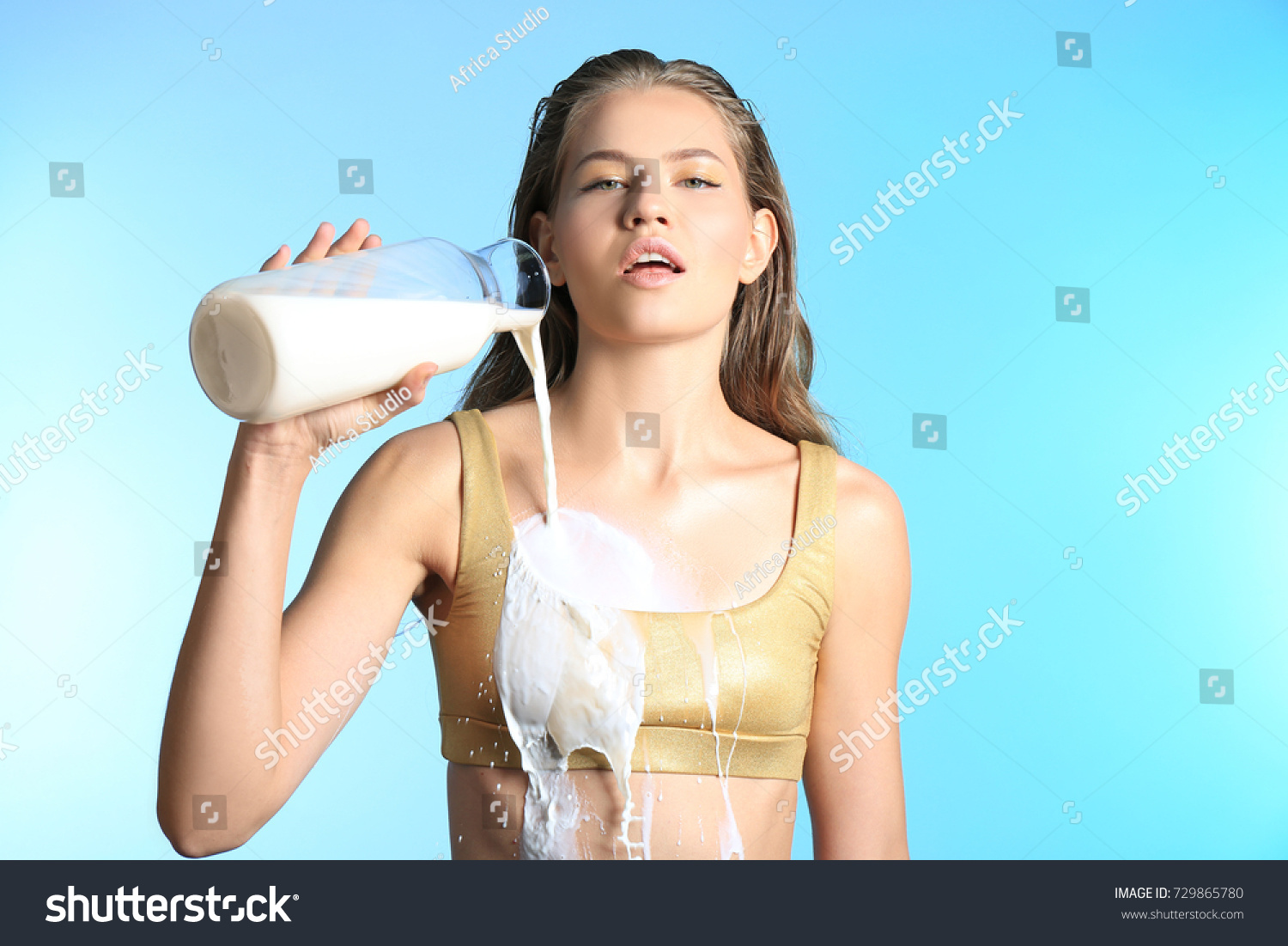 Girl Pouring Milk On Herself