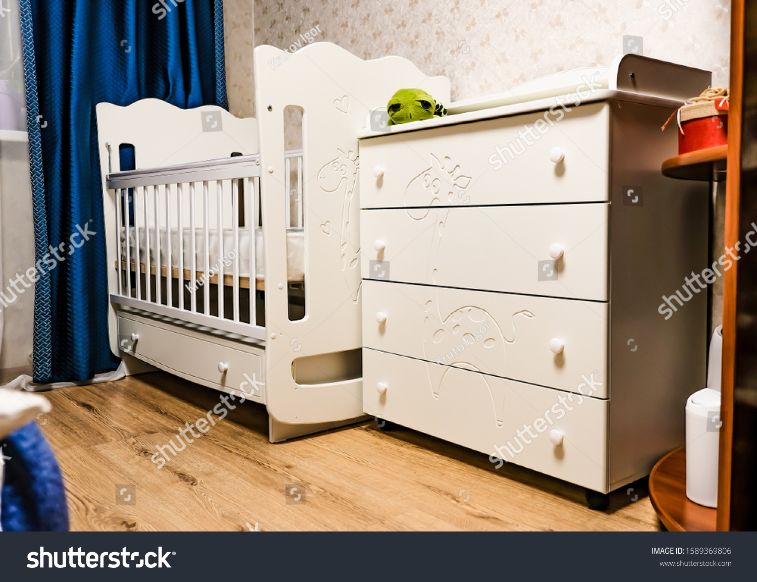 baby crib in living room