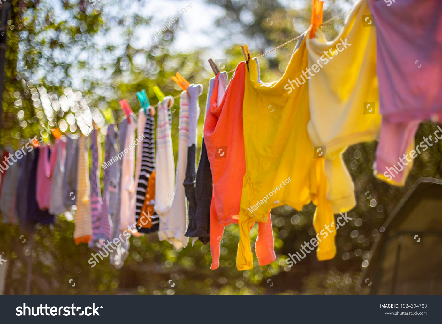 Baby Cute Clothes Hanging On Clothesline Stock Photo 1924394780 ...