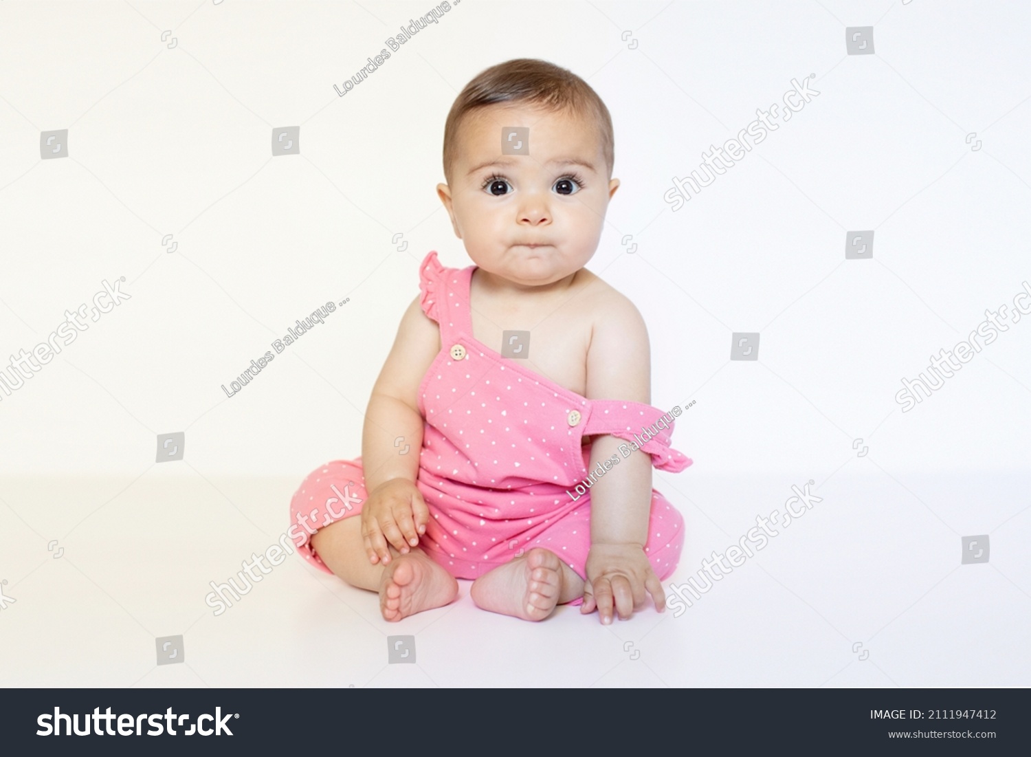 Baby Girl Sitting On White Background Stock Photo 2111947412 | Shutterstock