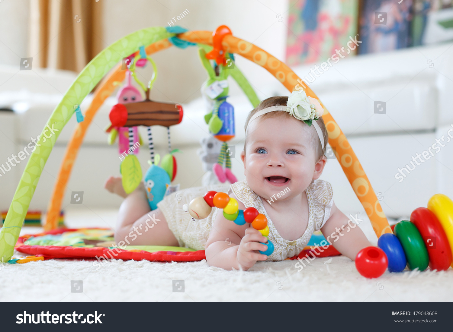 little baby playing with toys