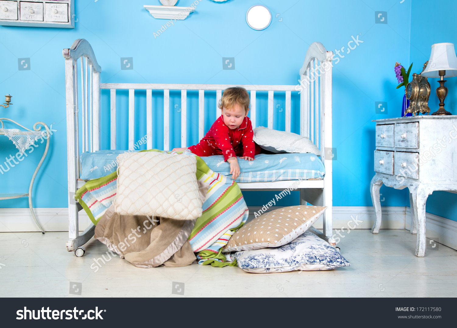 http://image.shutterstock.com/z/stock-photo-baby-playing-on-bed-172117580.jpg