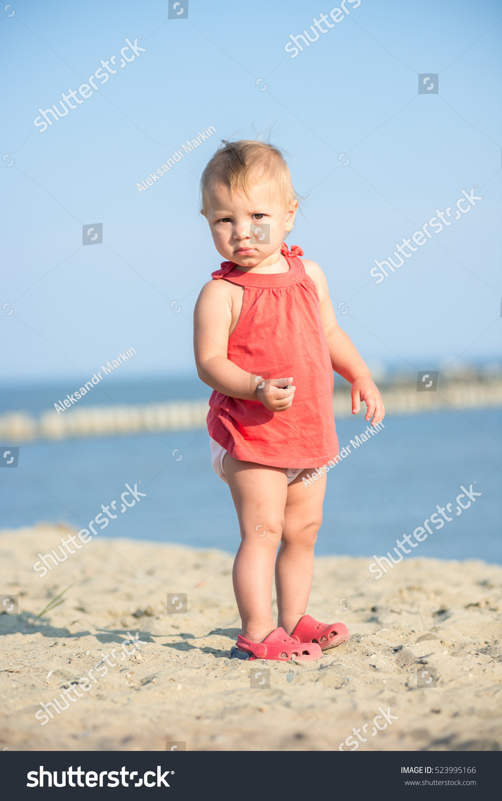 Baby Playing On Sandy Beach Near Stock Photo 523995166 | Shutterstock