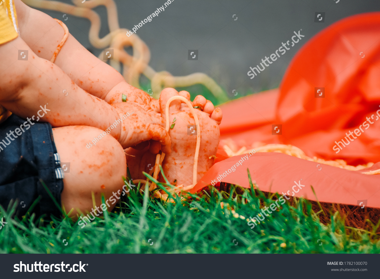 babys-hands-feet-covered-spaghetti-stock-photo-1782100070-shutterstock