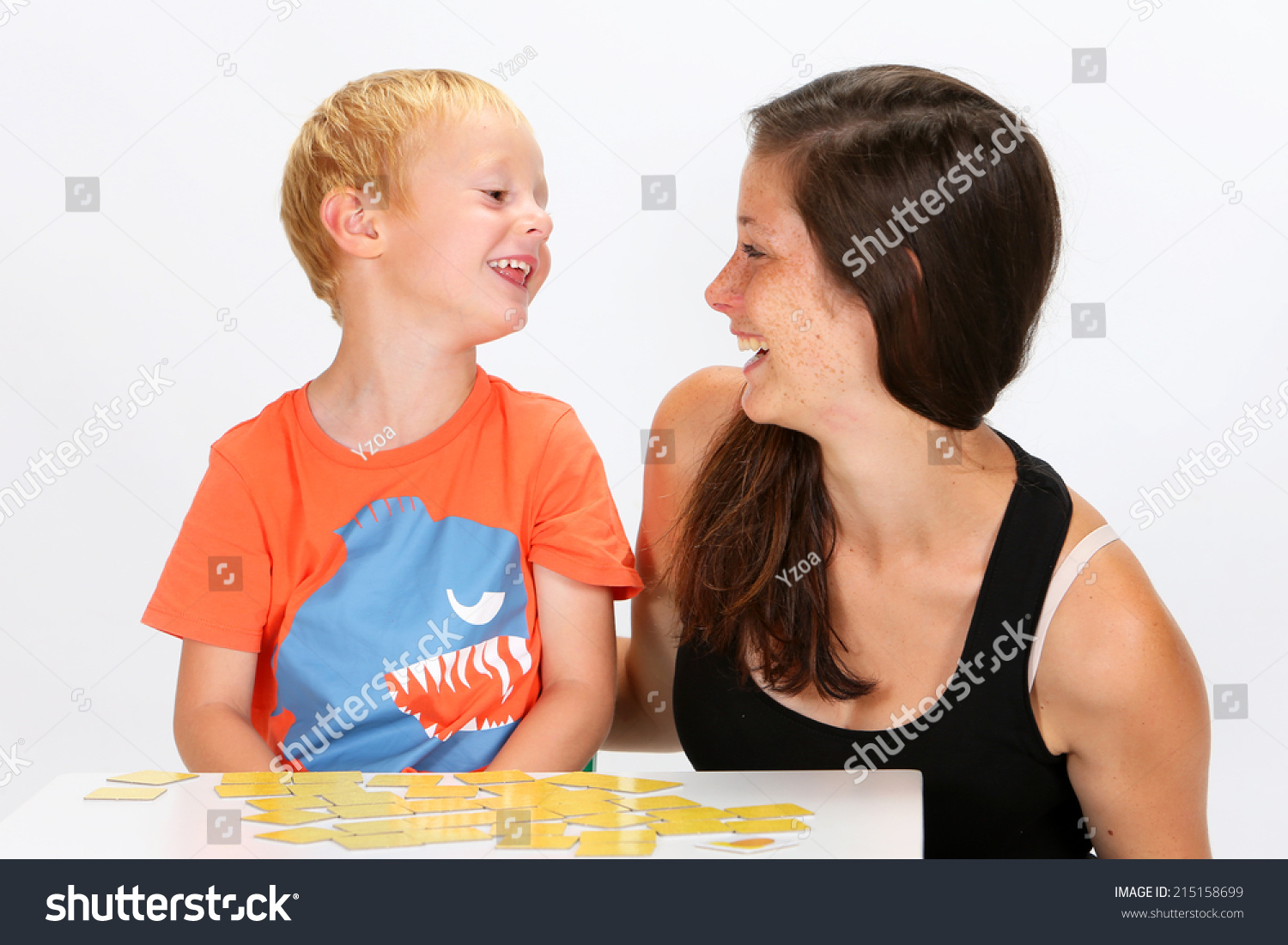 Babysitter Boy Playing Cards Stock