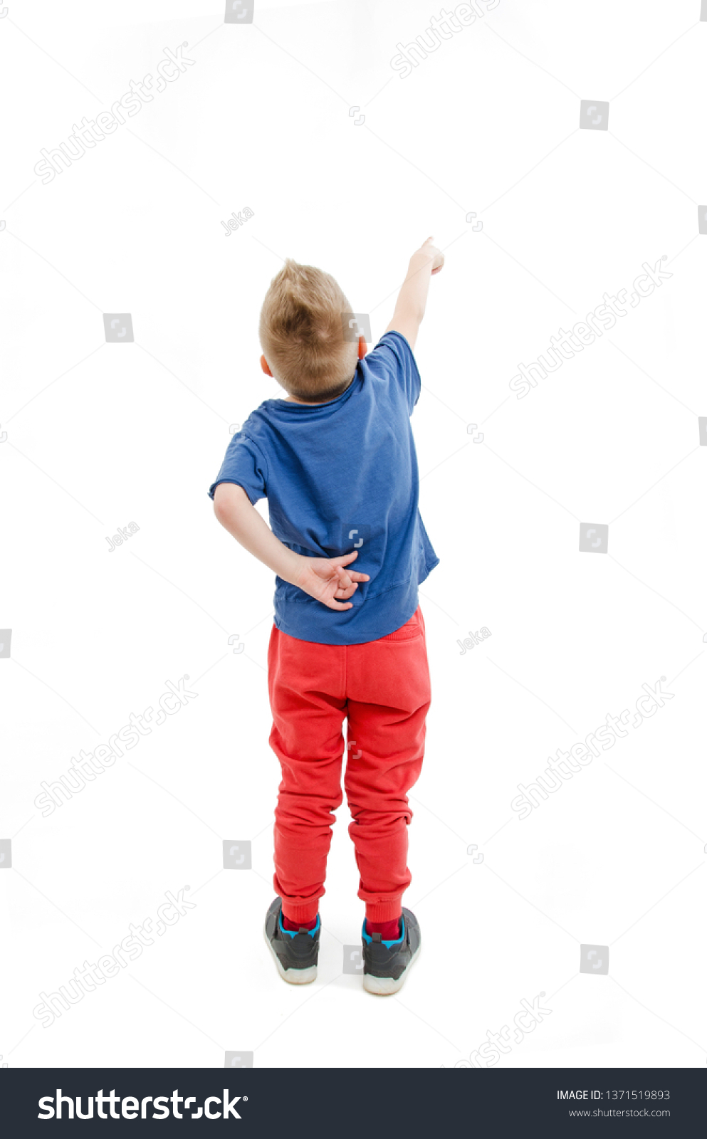 Back View Little Boy Points Wall Stock Photo 1371519893 | Shutterstock