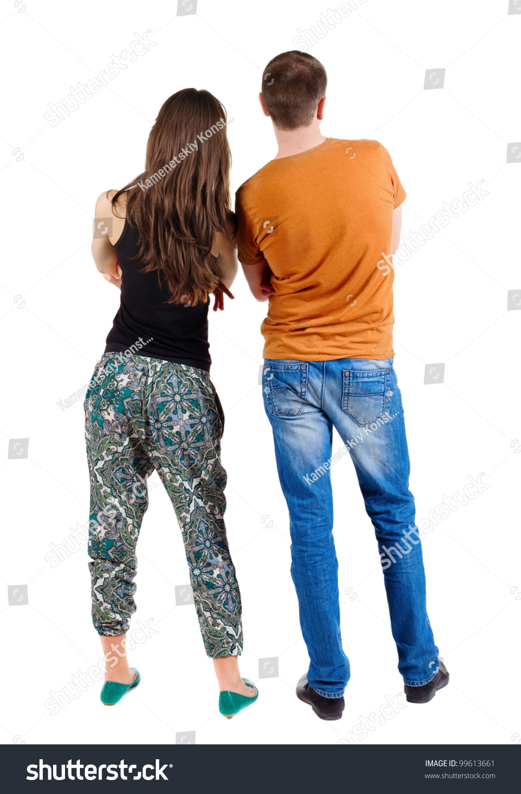 Back View Of Young Couple (Man And Woman) Hug And Look Into The ...